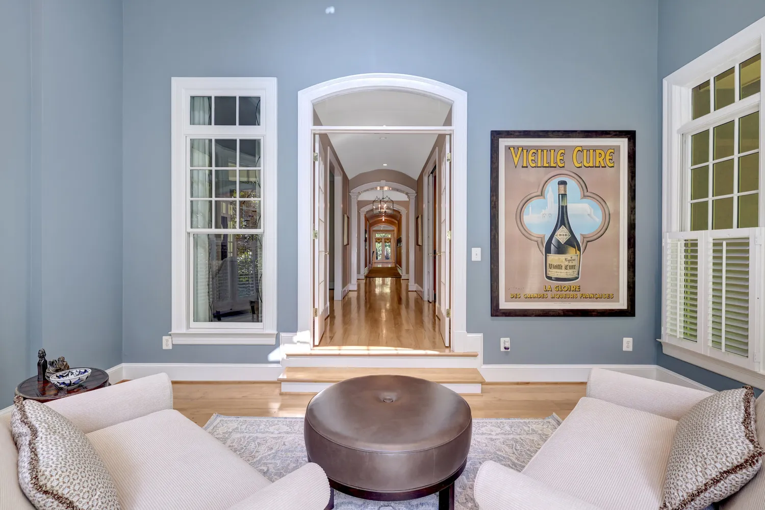 a dining room with furniture and window
