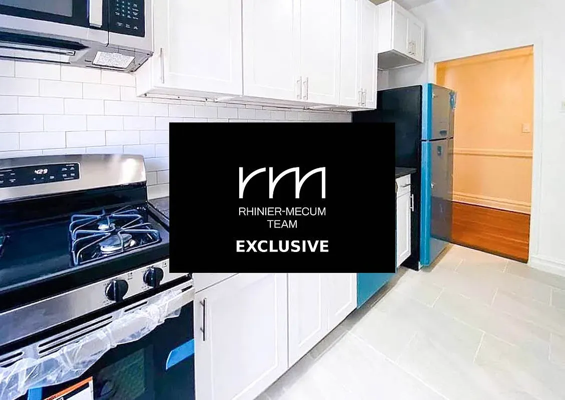 a kitchen with a stove and a microwave