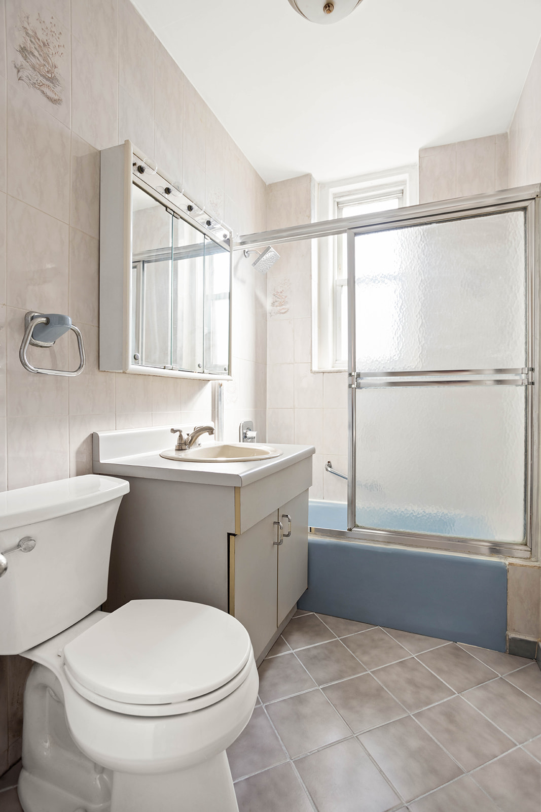 35-55 78th Street, Unit 42 Queens, NY 11372 - Photo 6 of 11 a bathroom with a sink toilet and shower