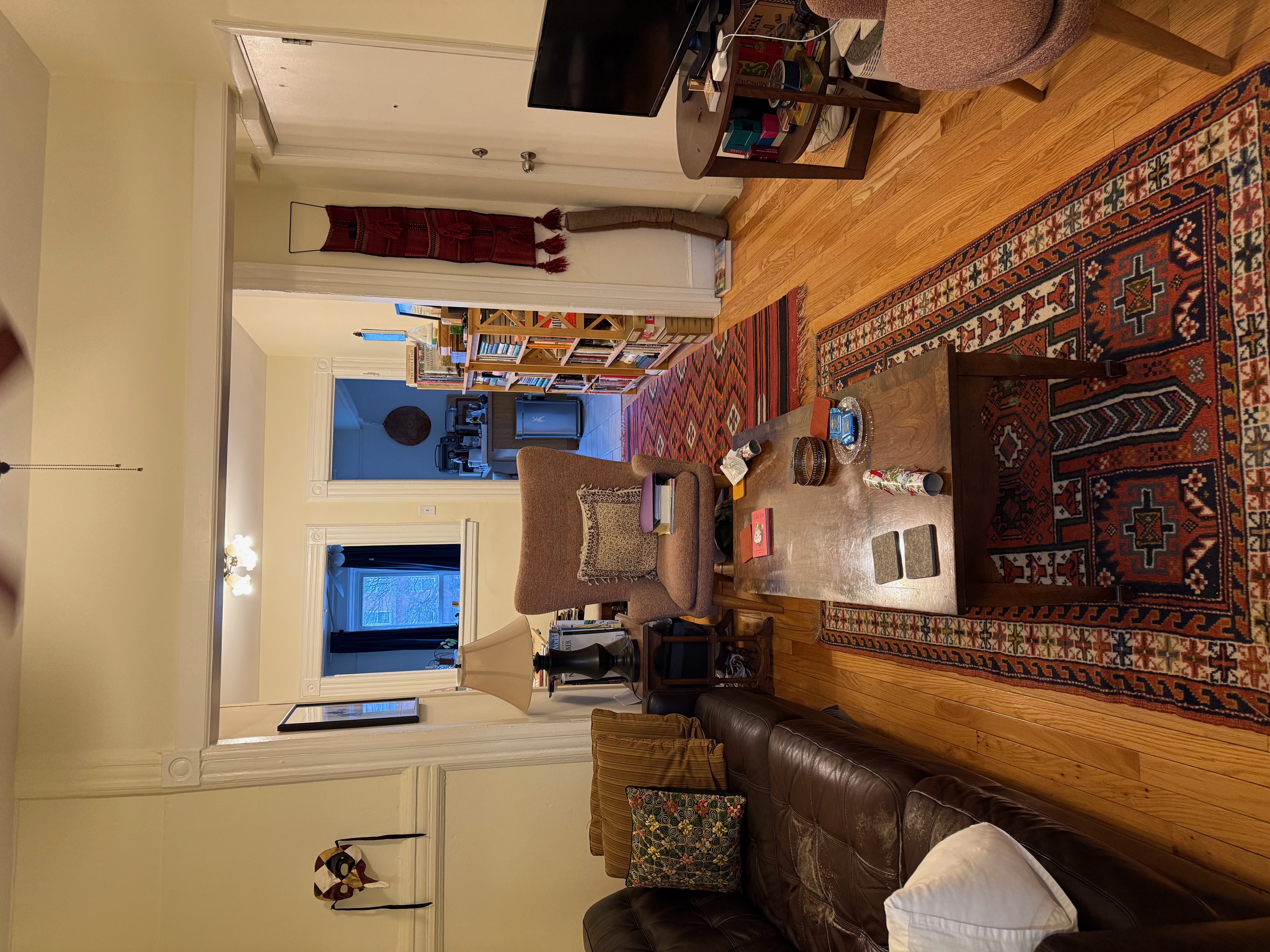 23 Saint Marks Avenue, Unit 3 Brooklyn, NY 11217 - Photo 2 of 10 a living room with furniture and a flat screen tv