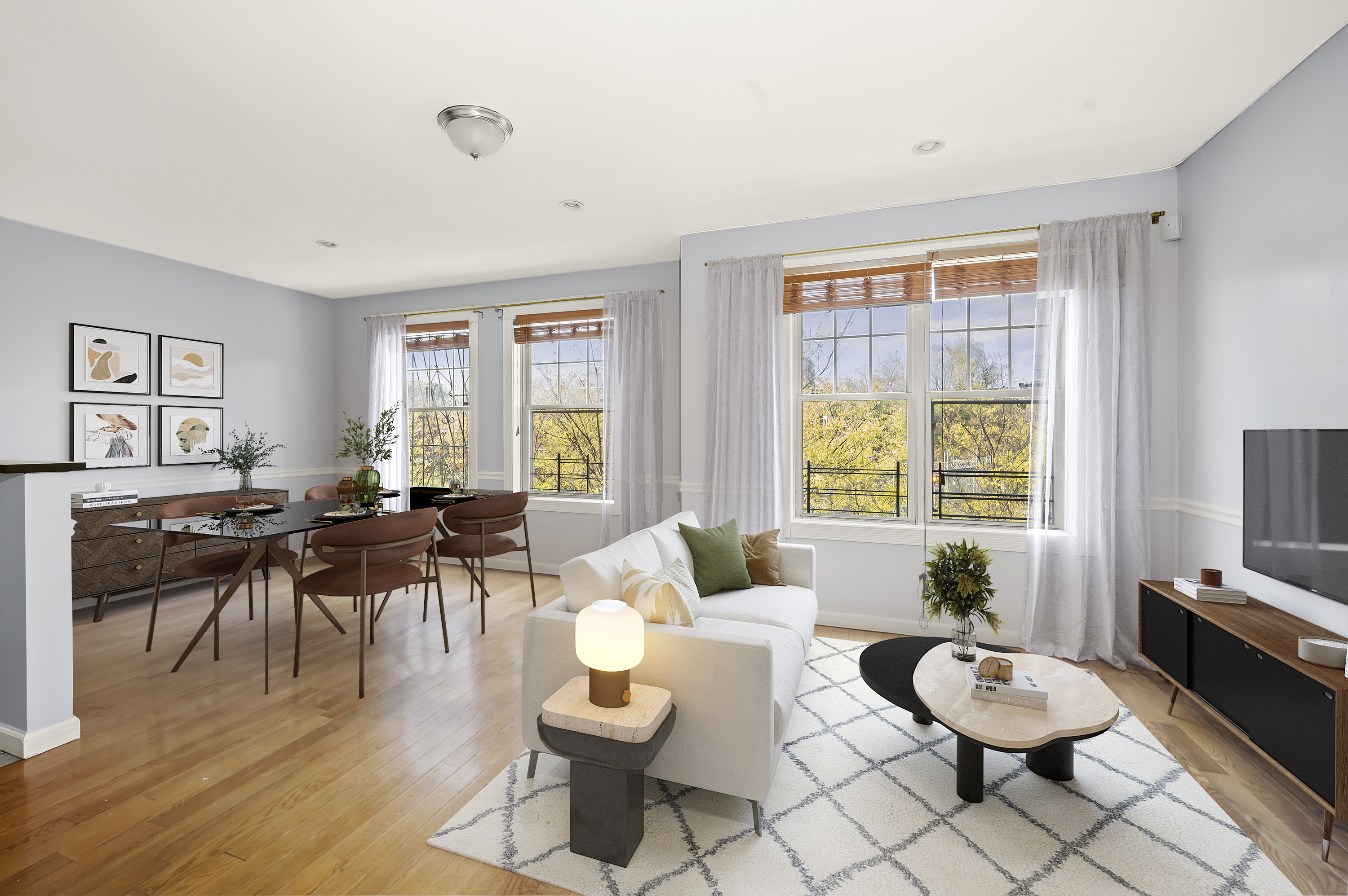 930 Jefferson Avenue, Unit 2 Brooklyn, NY 11221 - Photo 1 of 12 a living room with furniture and a large window