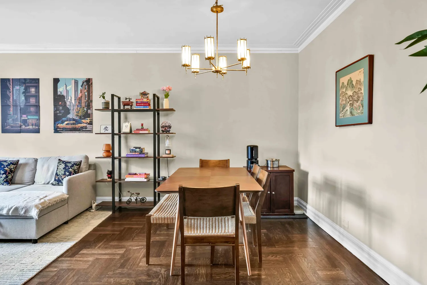 a view of a dining room with furniture and wooden floor