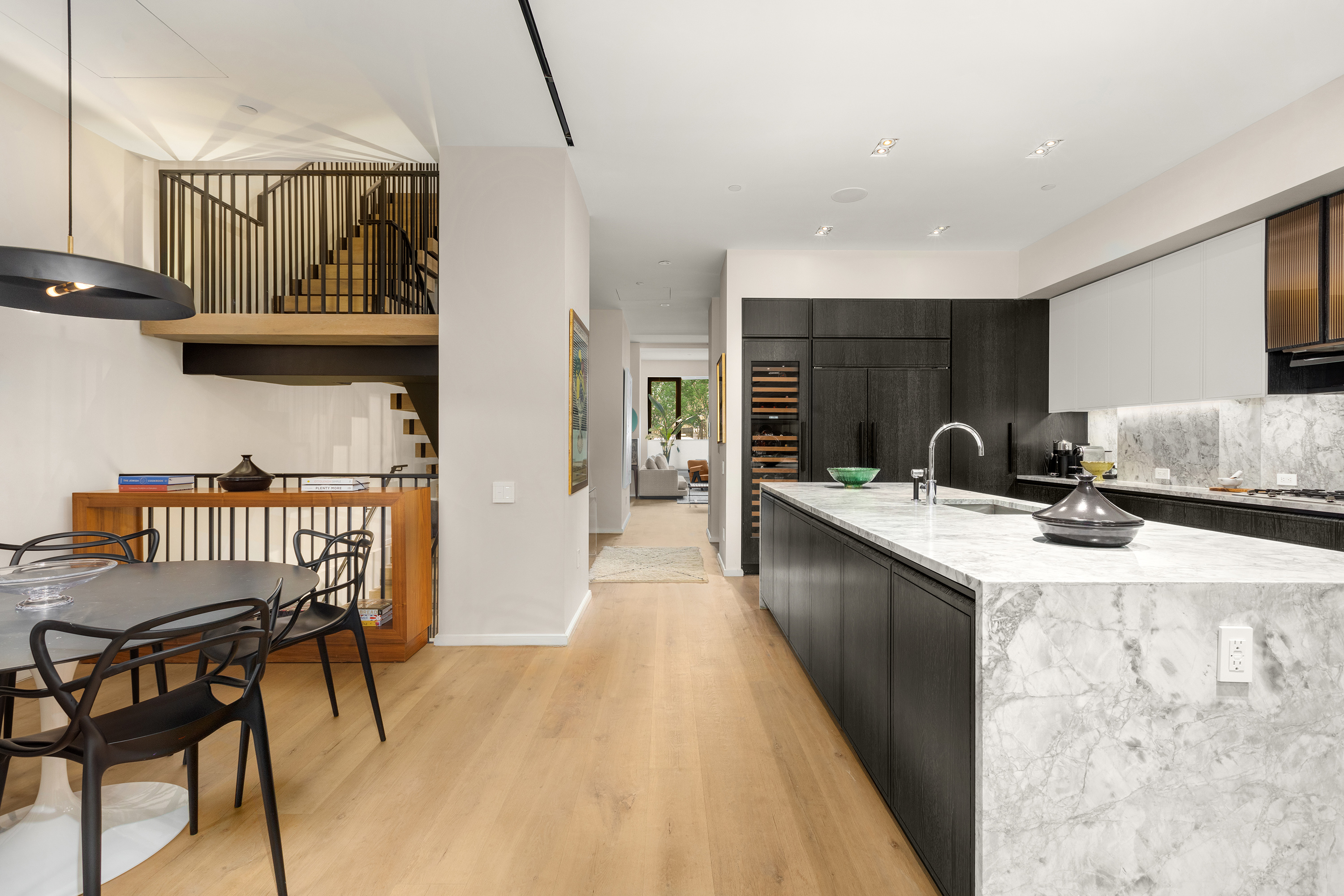 11 Beach Street, Unit THA Manhattan, NY 10013 - Photo 7 of 29 a kitchen with granite countertop a sink and cabinets