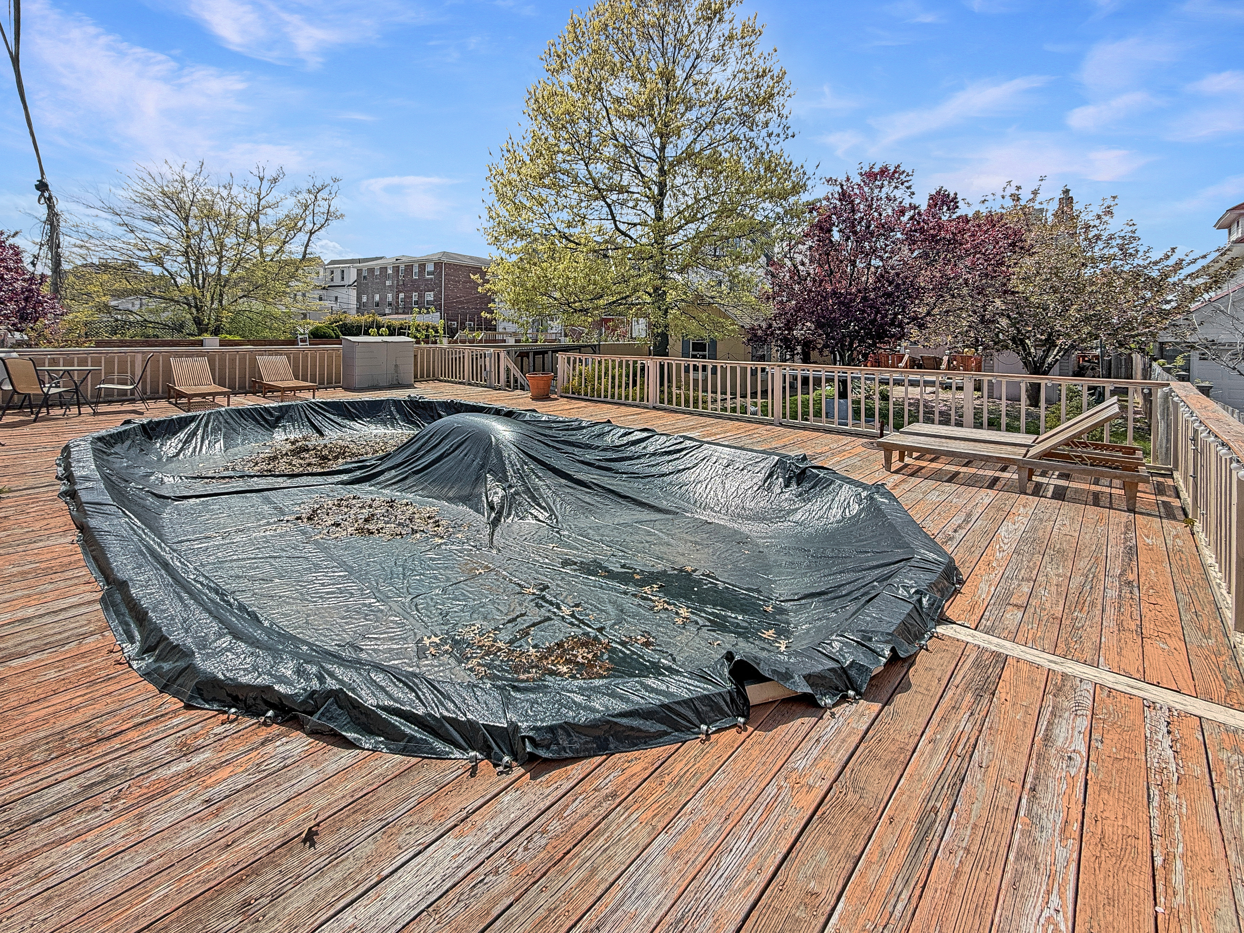 5007 Surf Avenue Brooklyn, NY 11224 - Photo 28 of 37 a view of a swimming pool with a deck and living room