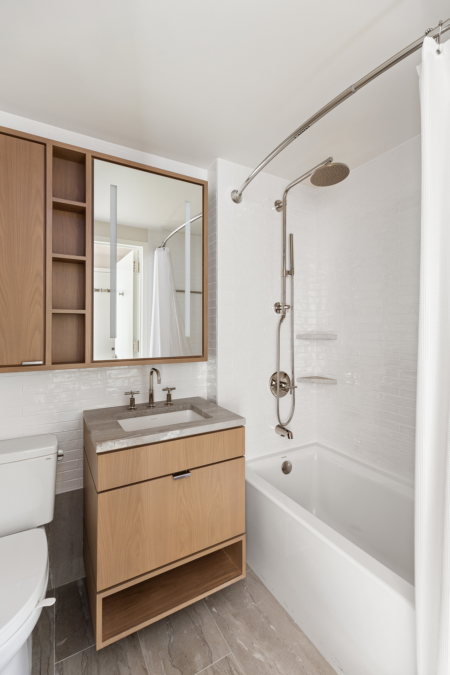 20 River Terrace, Unit 22A Manhattan, NY 10282 - Photo 9 of 27 a bathroom with a granite countertop sink a toilet and shower