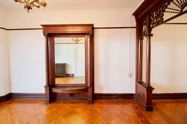 a bedroom with a bed and a door