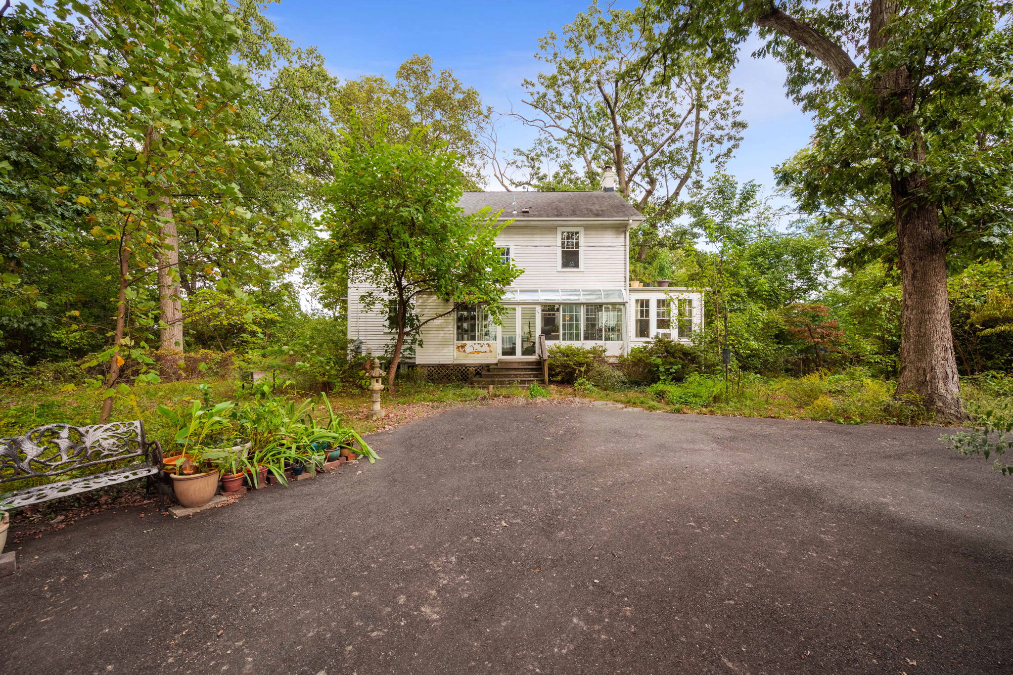 3104 Russell Road Alexandria, VA 22305 - Photo 26 of 62 a front view of a house with a yard and tree s