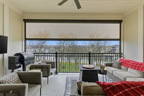 a view of a park with large trees