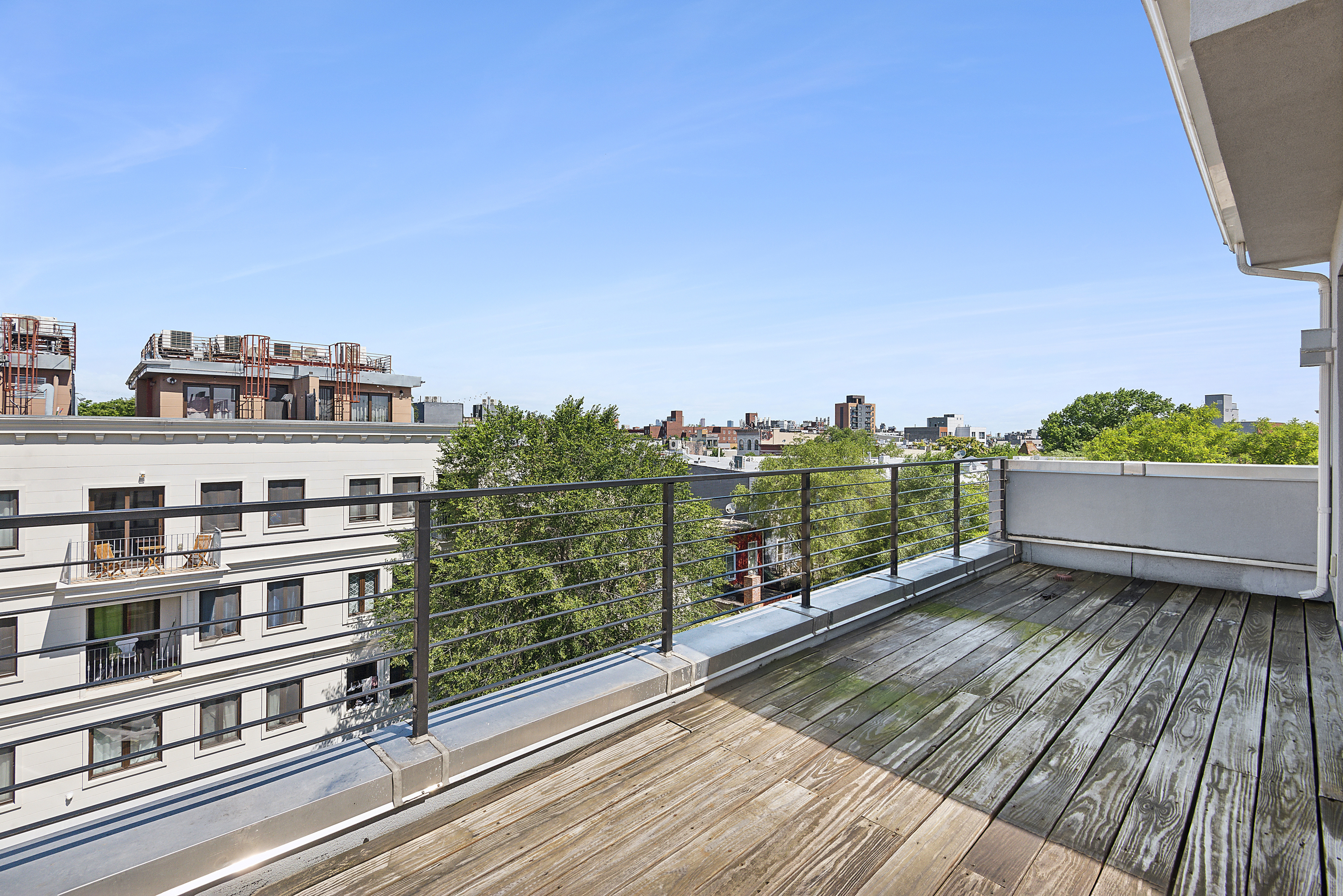 27 Dodworth Street, Unit PHF Brooklyn, NY 11221 - Photo 8 of 18 a view of a balcony with city view