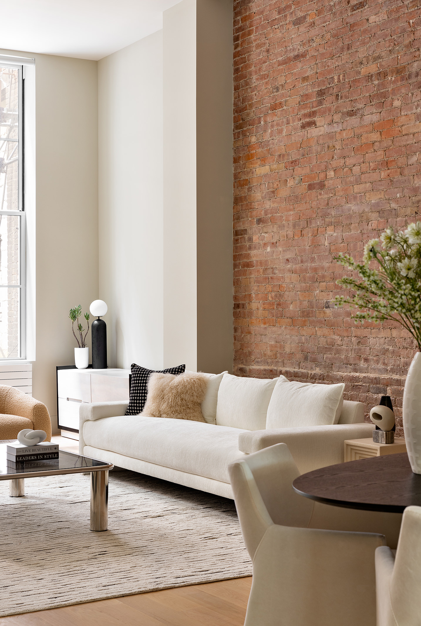 66 Reade Street, Unit TH Manhattan, NY 10007 - Photo 4 of 18 a living room with furniture and a table