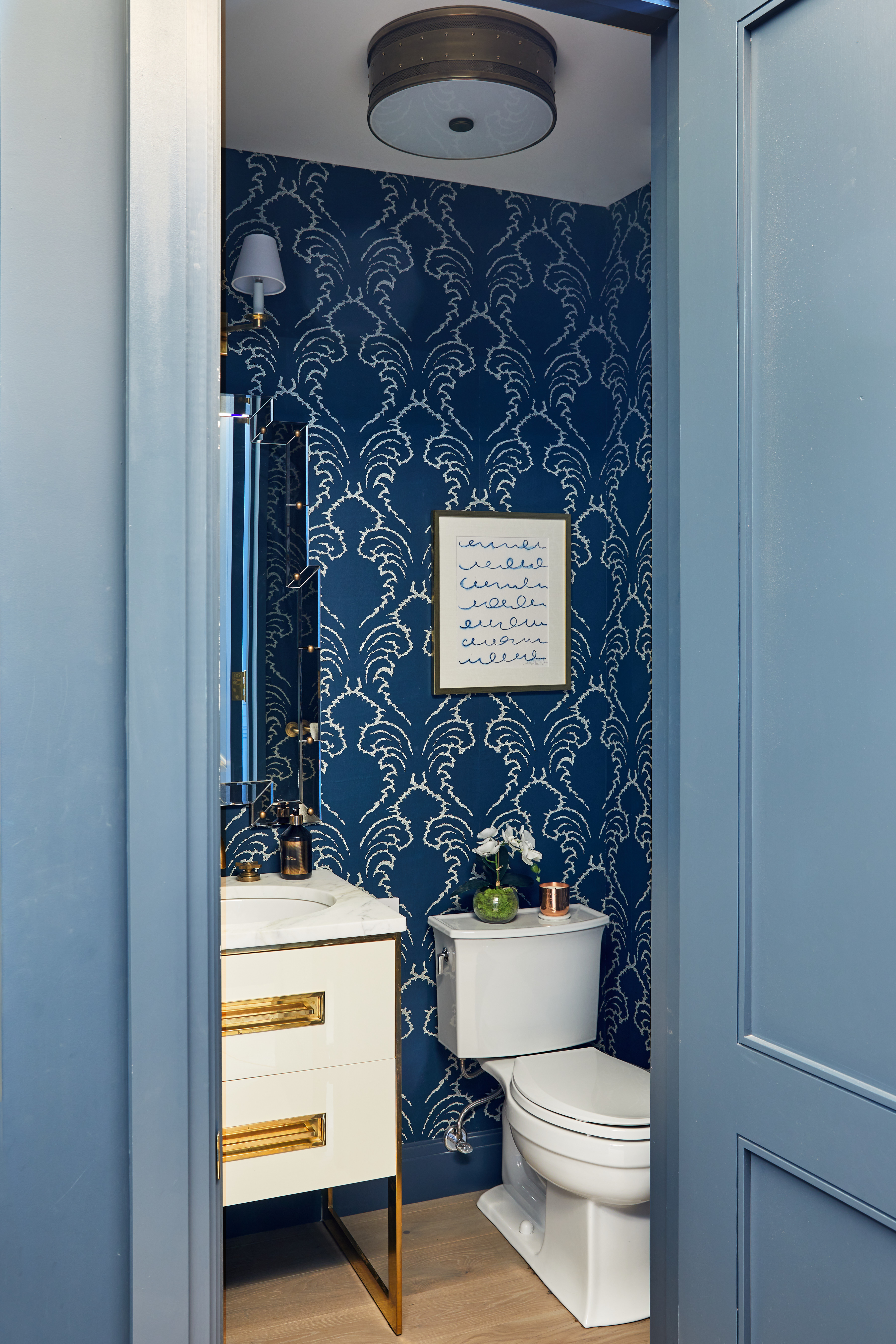100 West 80th Street, Unit 5B Manhattan, NY 10024 - Photo 8 of 19 a bathroom with a toilet a sink and a mirror