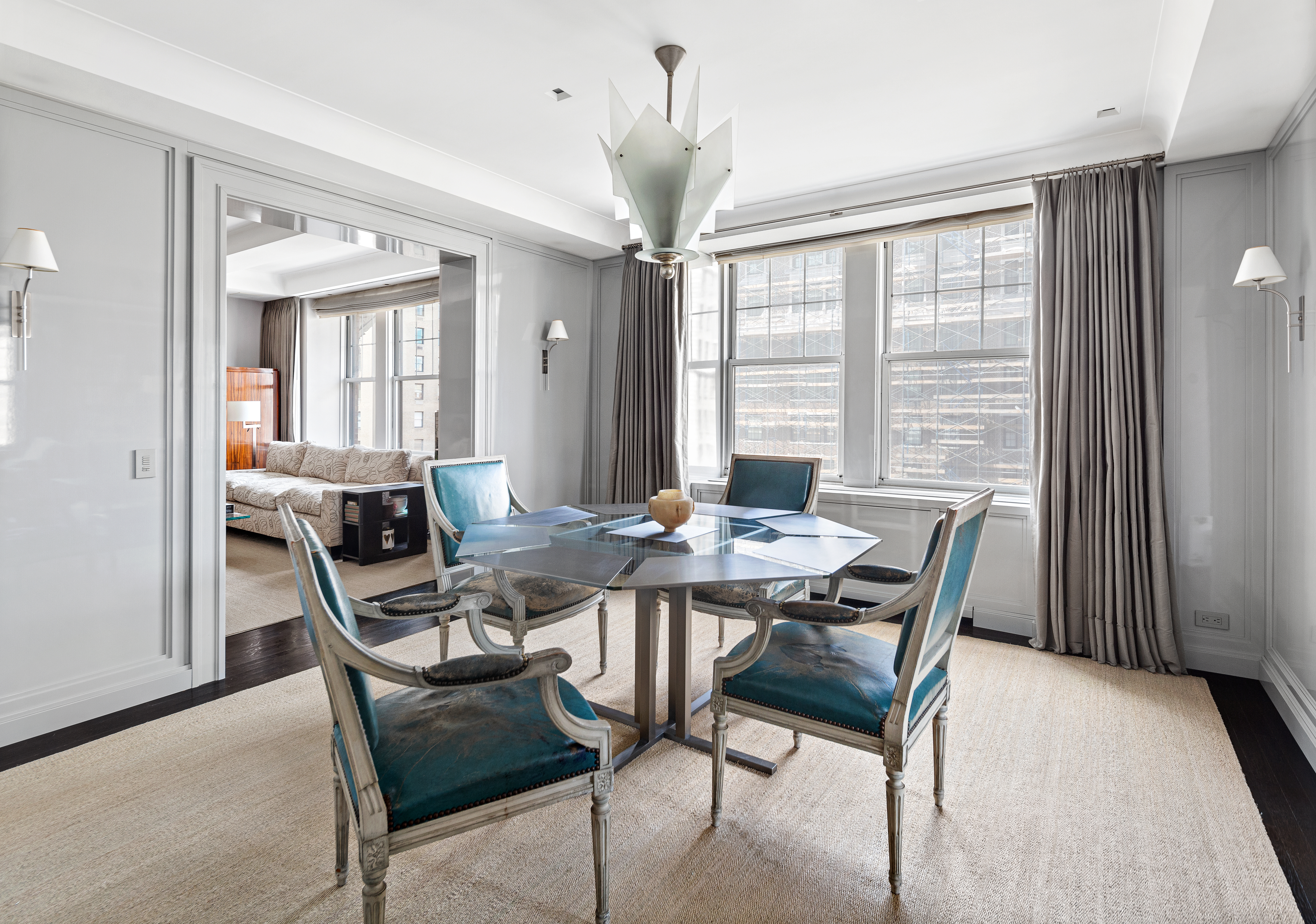 575 Park Avenue, Unit 902 Manhattan, NY 10065 - Photo 4 of 17 a view of a dining room with furniture window and outside view