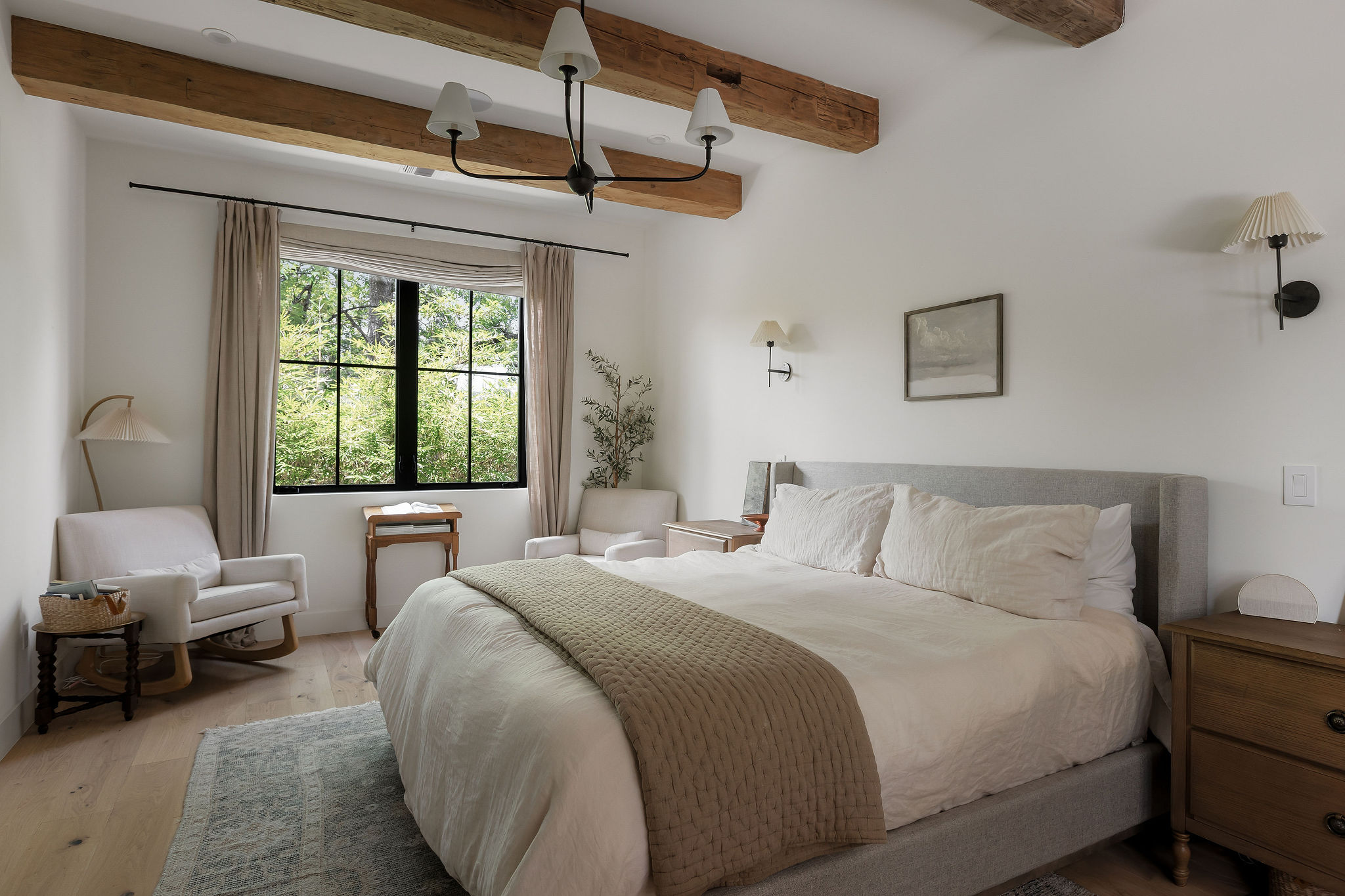 4700 Clawson Road Austin, TX 78745 - Photo 12 of 26 a bedroom with a bed a couch and window