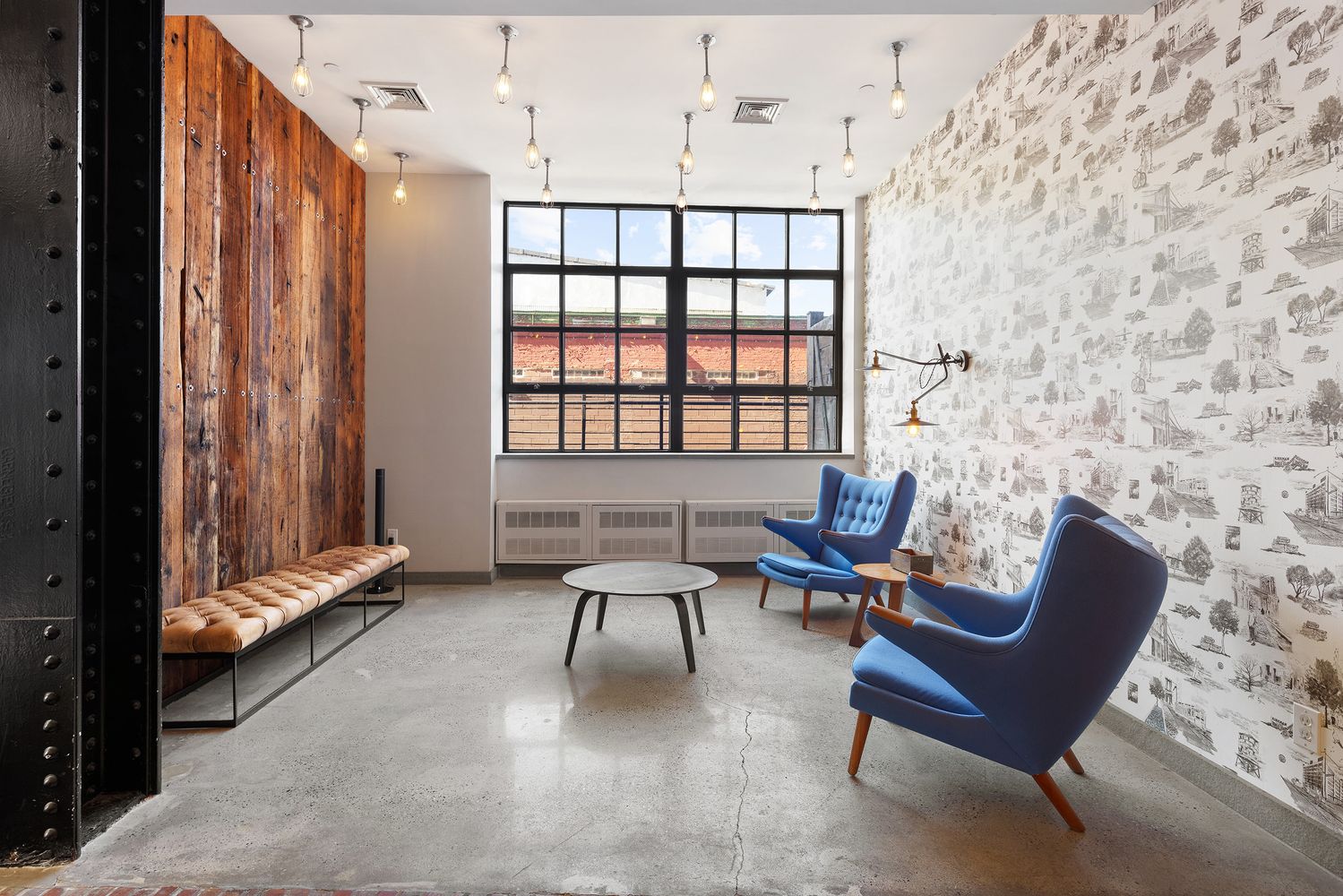 a living room with furniture and a window
