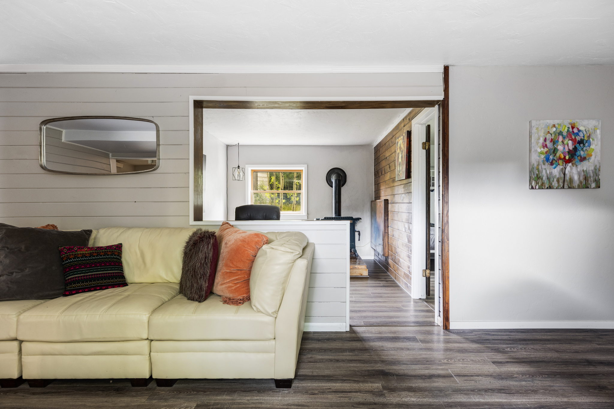 133 Gold Run Road Alma, CO 80420 - Photo 13 of 46 a bedroom with a bed and a potted plant