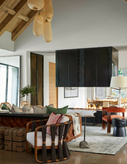 5716 Stonegate Road Dallas, TX 75209 - Photo 6 of 25 a living room with furniture and a lamp