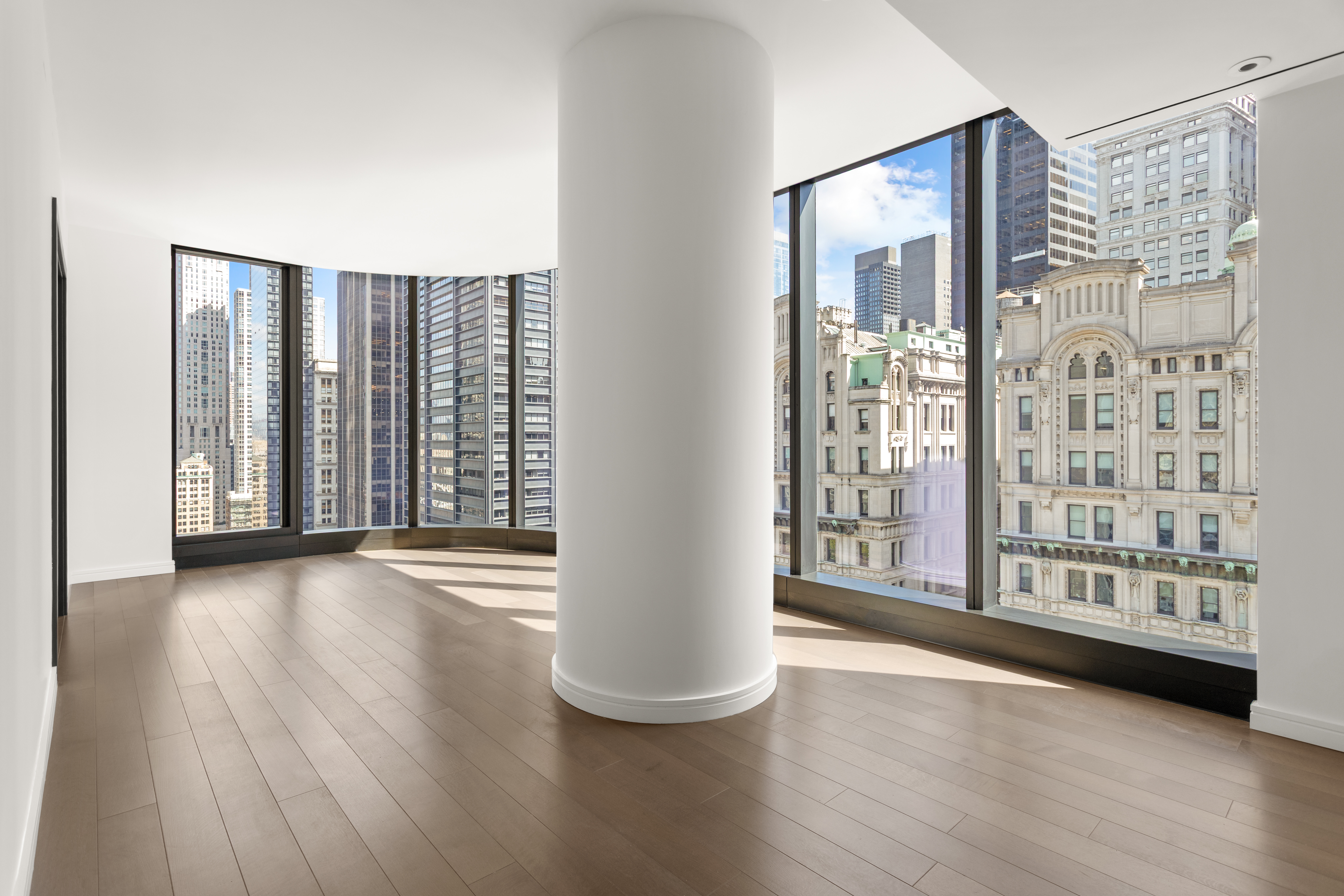 125 Greenwich Street, Unit 31A Manhattan, NY 10006 - Photo 10 of 23 a view of an empty room with glass door and glass door
