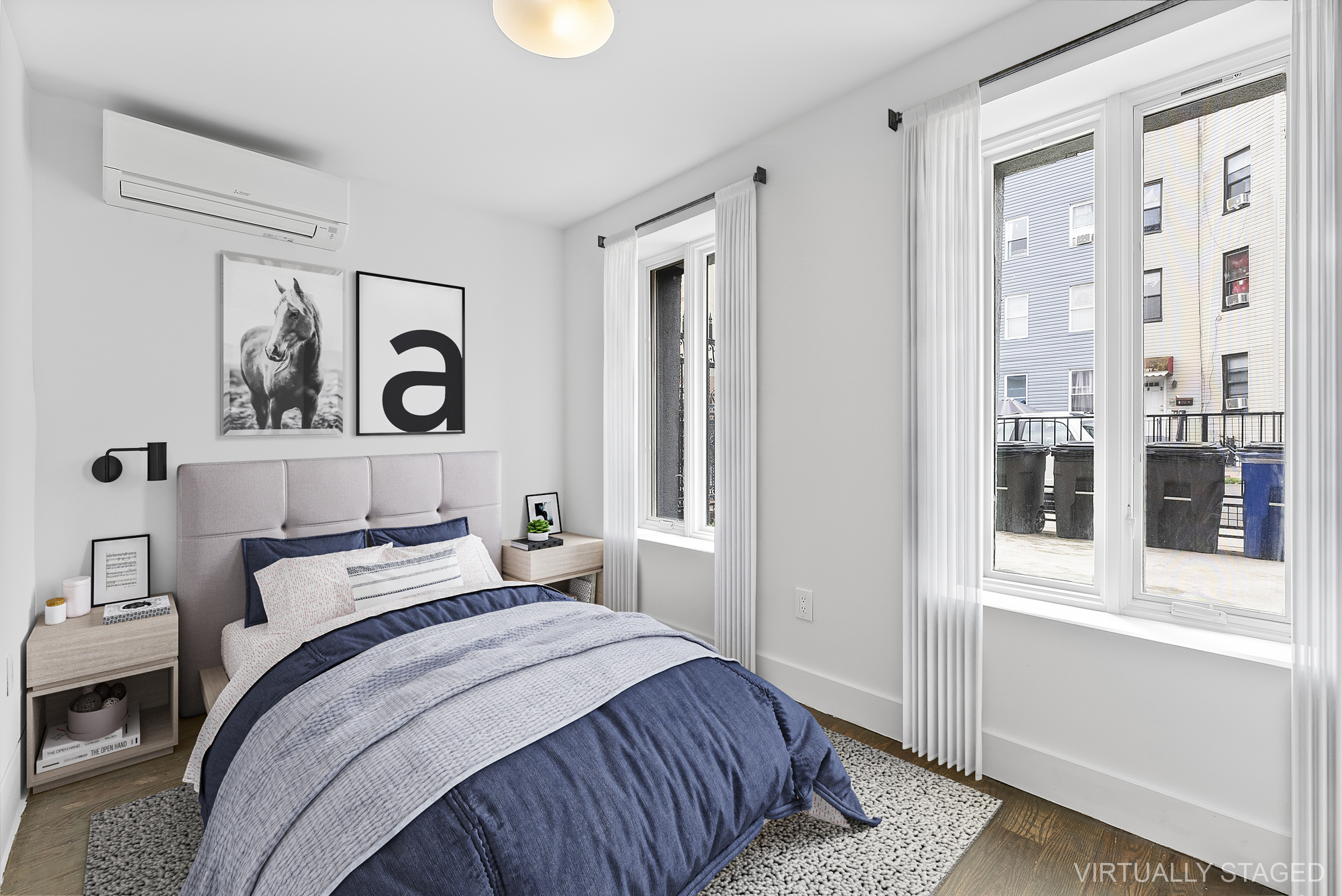 81 Eldert Street, Unit 1 Brooklyn, NY 11207 - Photo 9 of 9 a bedroom with a bed and a window