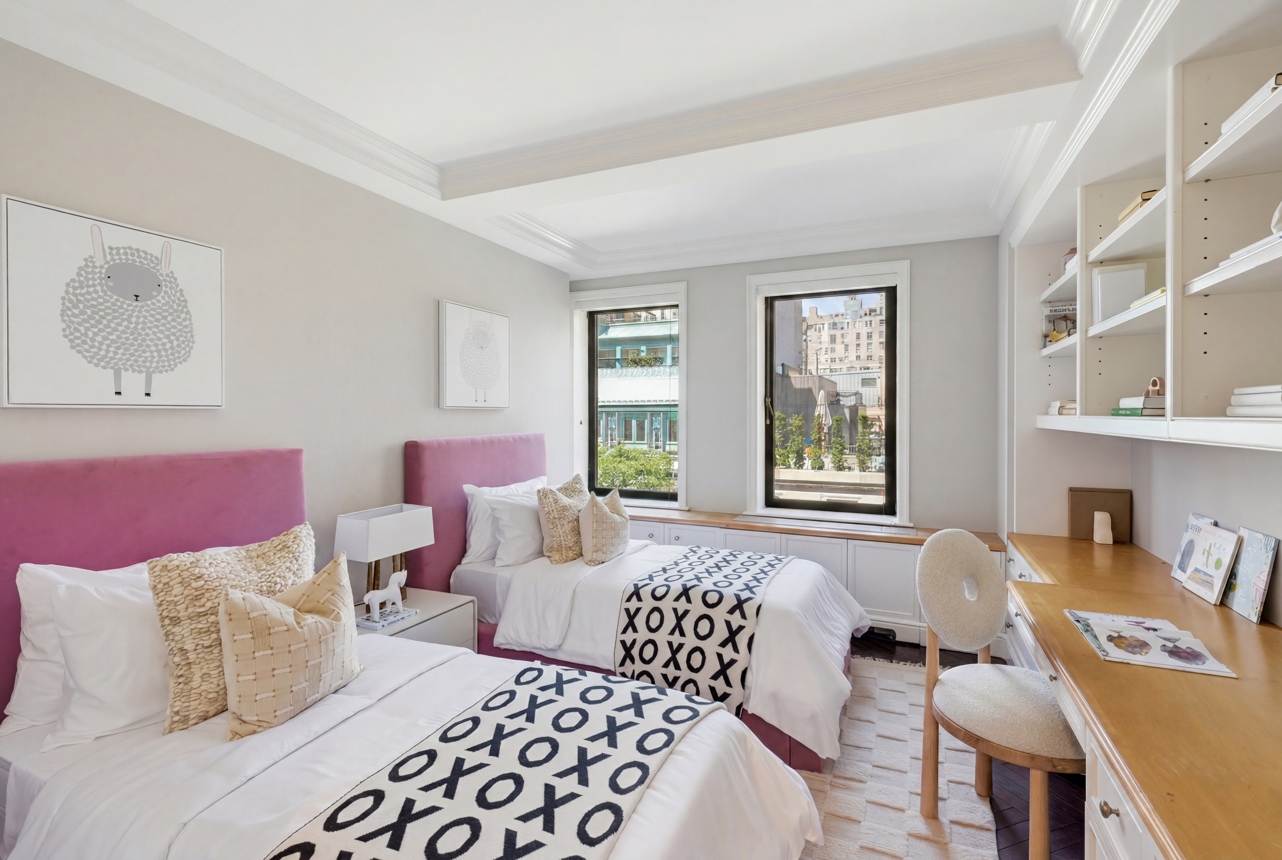 15 East 69th Street, Unit 7A Manhattan, NY 10021 - Photo 17 of 23 a bedroom with a bed and wooden floor