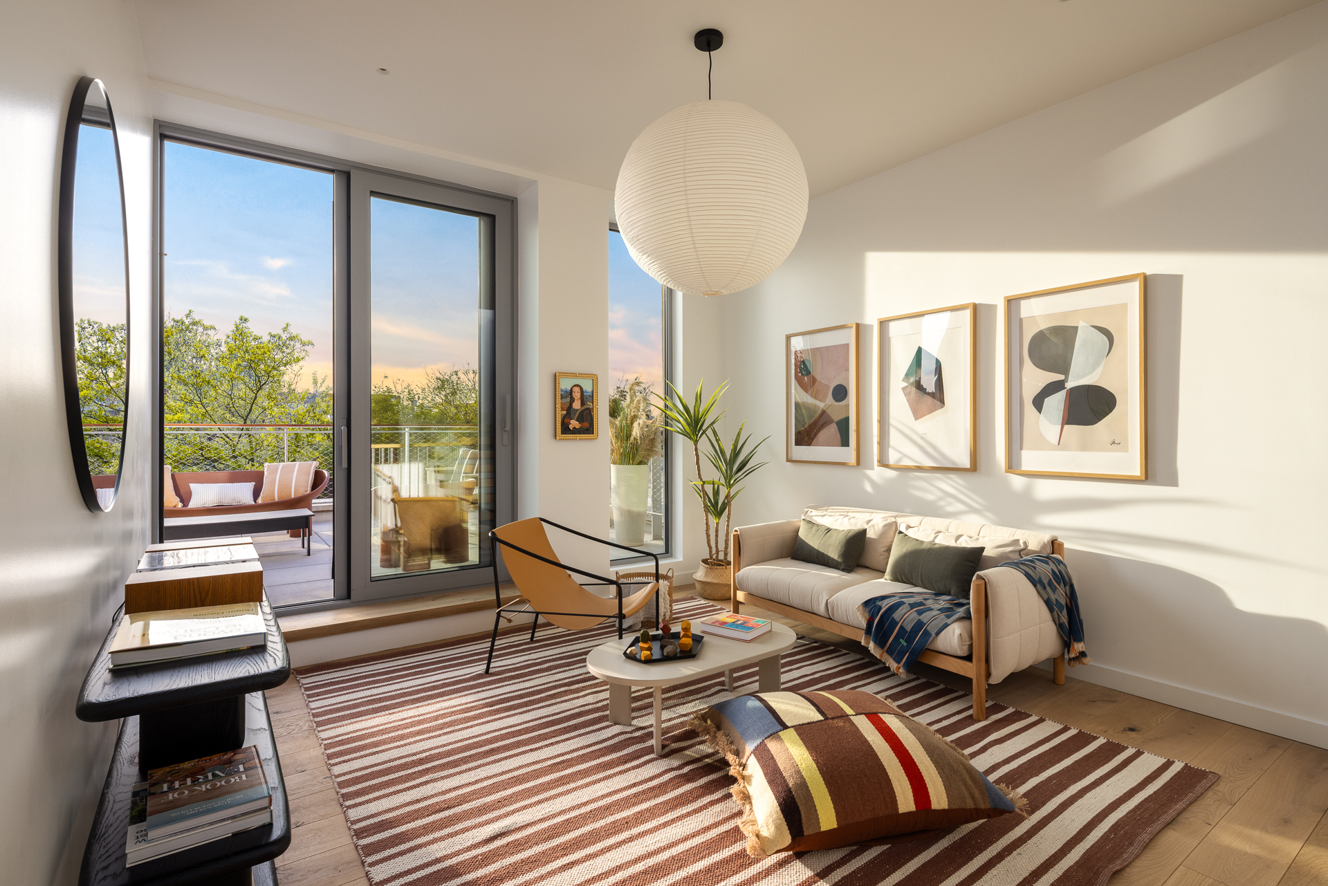 584 Leonard Street, Unit PHB Brooklyn, NY 11222 - Photo 9 of 22 a living room with furniture and a large window