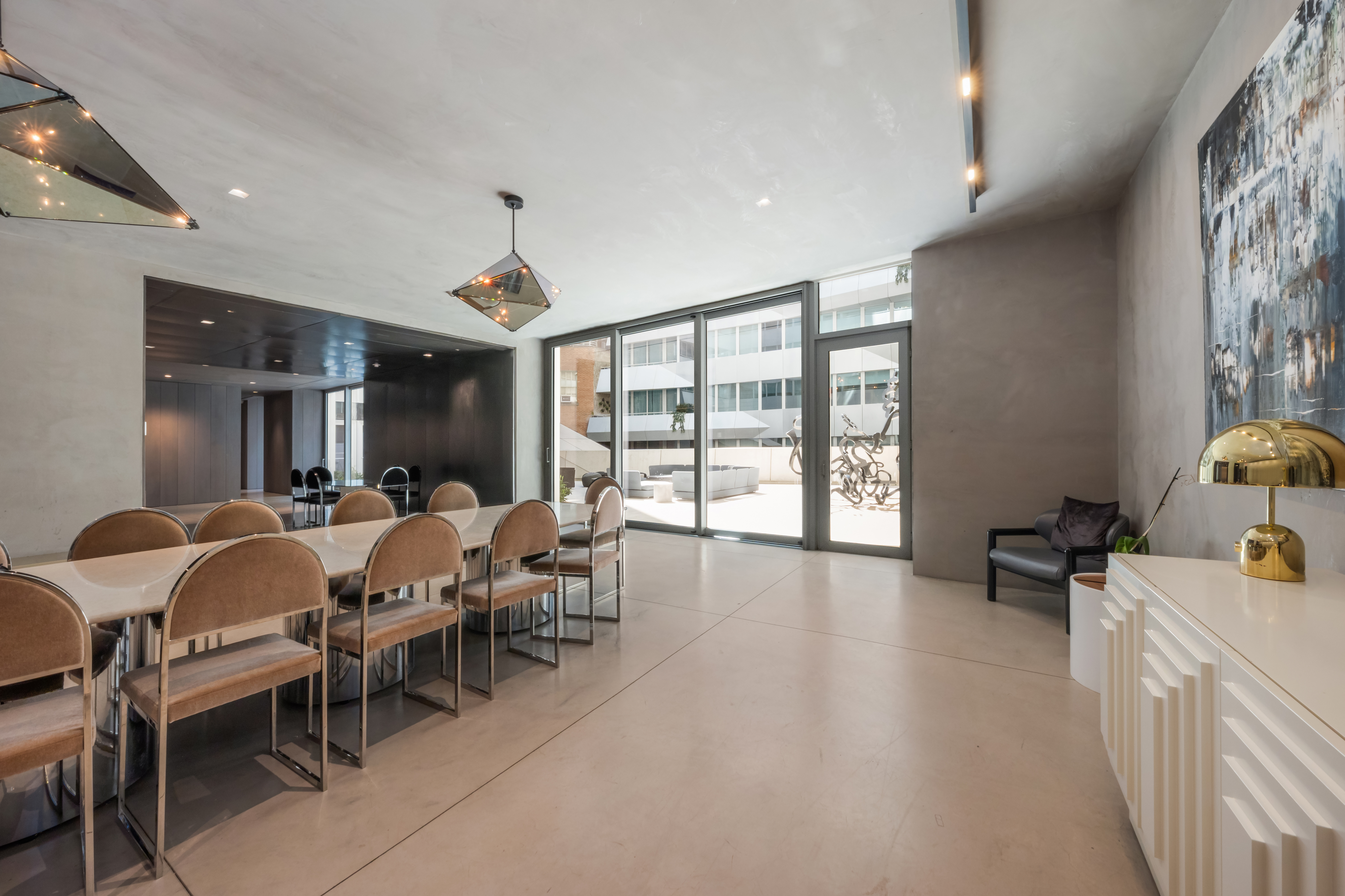 121 East 22nd Street, Unit N1405 Manhattan, NY 10010 - Photo 12 of 19 a view of a dining room with furniture window and outside view