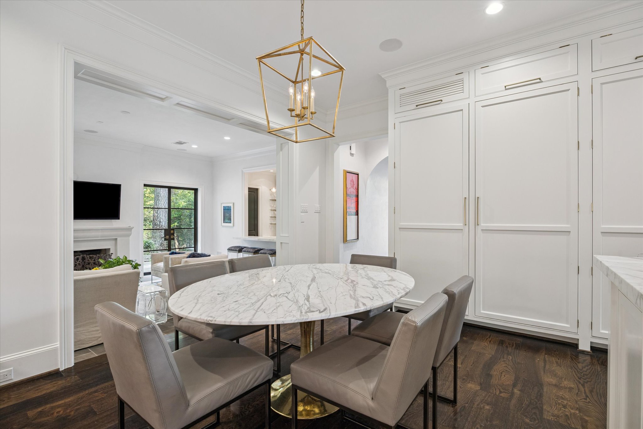310 Longwoods Lane Houston, TX 77024 - Photo 15 of 49 a view of a dining room with furniture window and wooden floor
