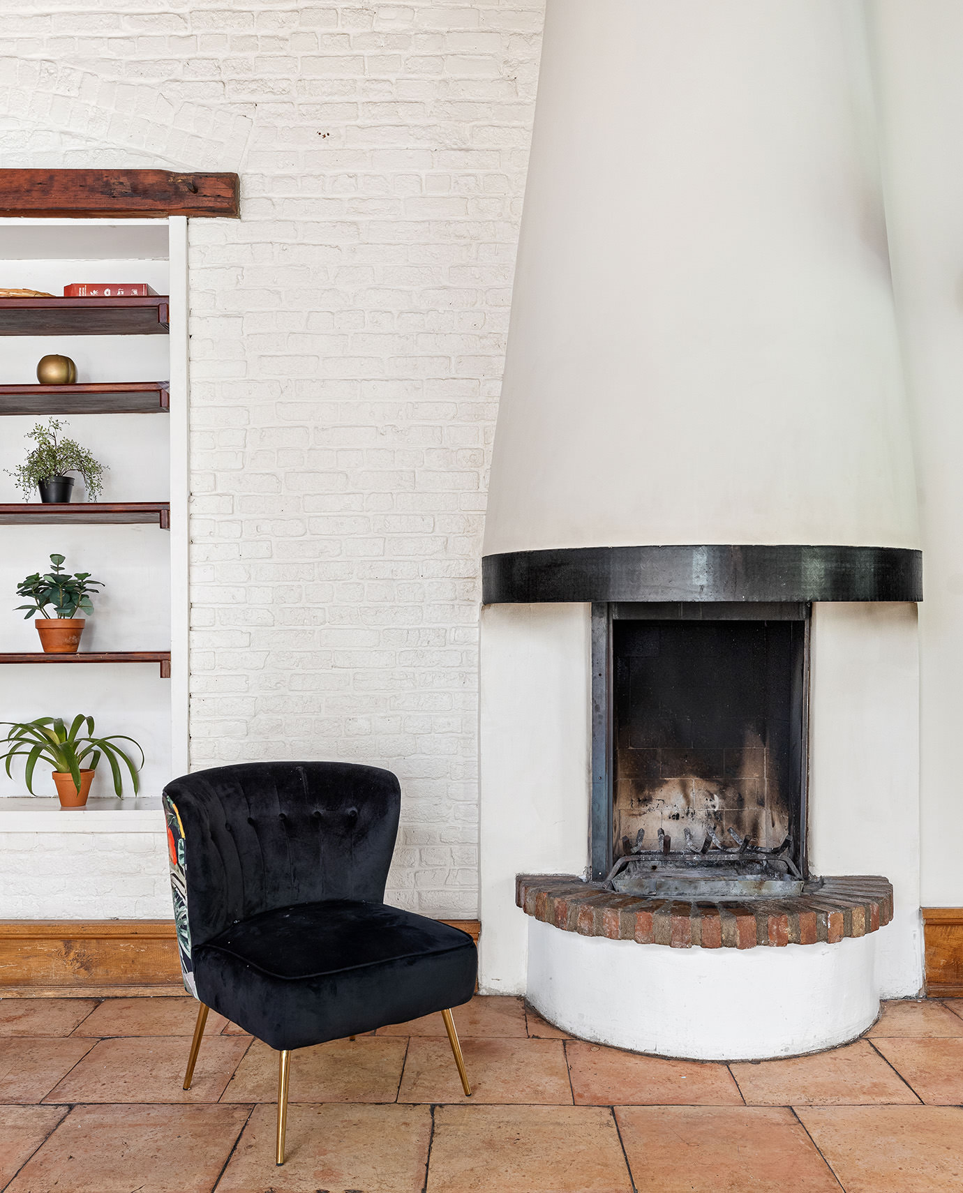 170 Eldridge Street Manhattan, NY 10002 - Photo 9 of 19 a living room with furniture and a fireplace