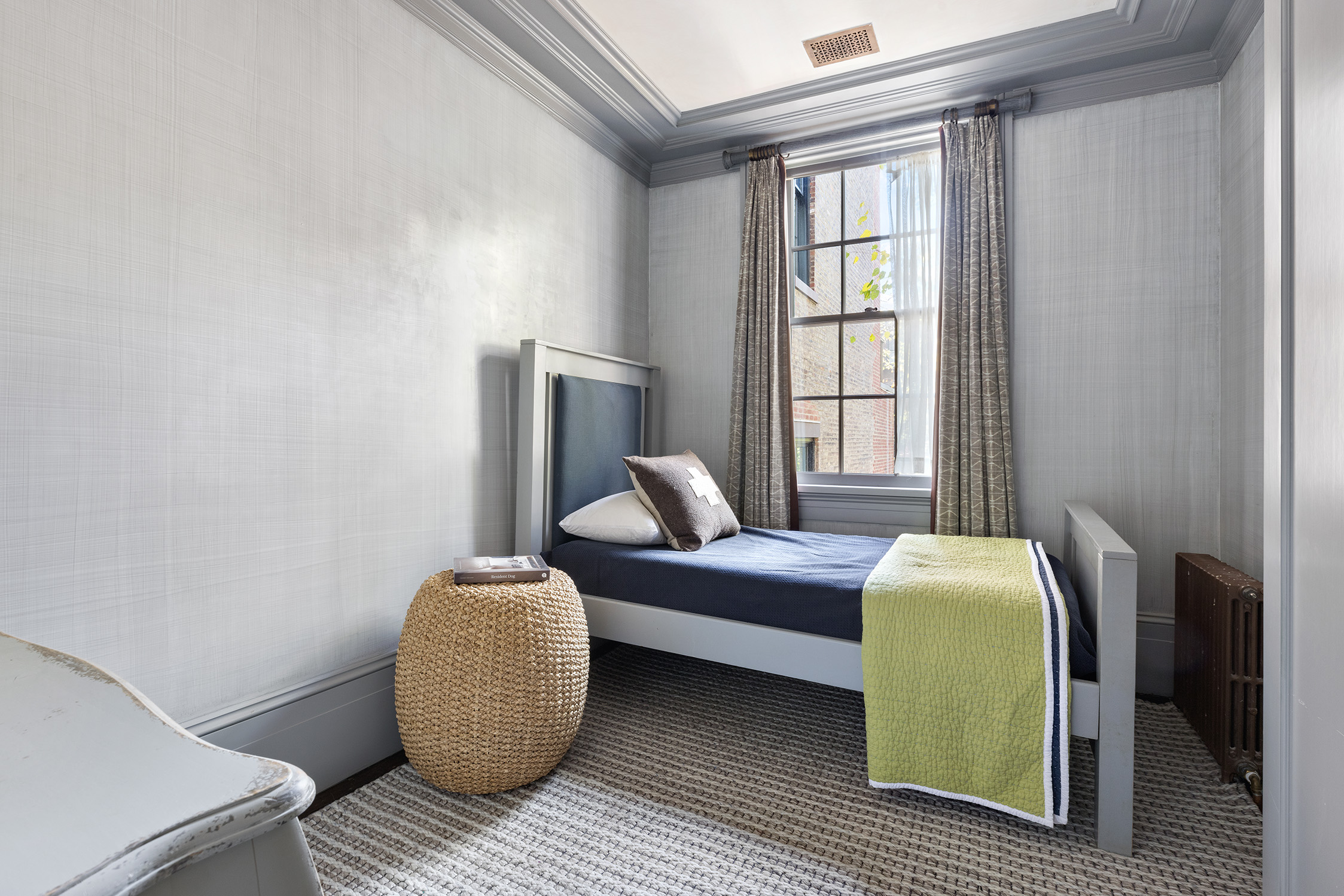 68 Morton Street Manhattan, NY 10014 - Photo 13 of 21 a living room with furniture and a window