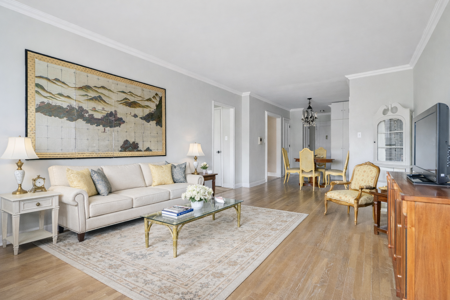 5614 Netherland Avenue, Unit 4E Bronx, NY 10471 - Photo 1 of 8 a living room with furniture and wooden floor