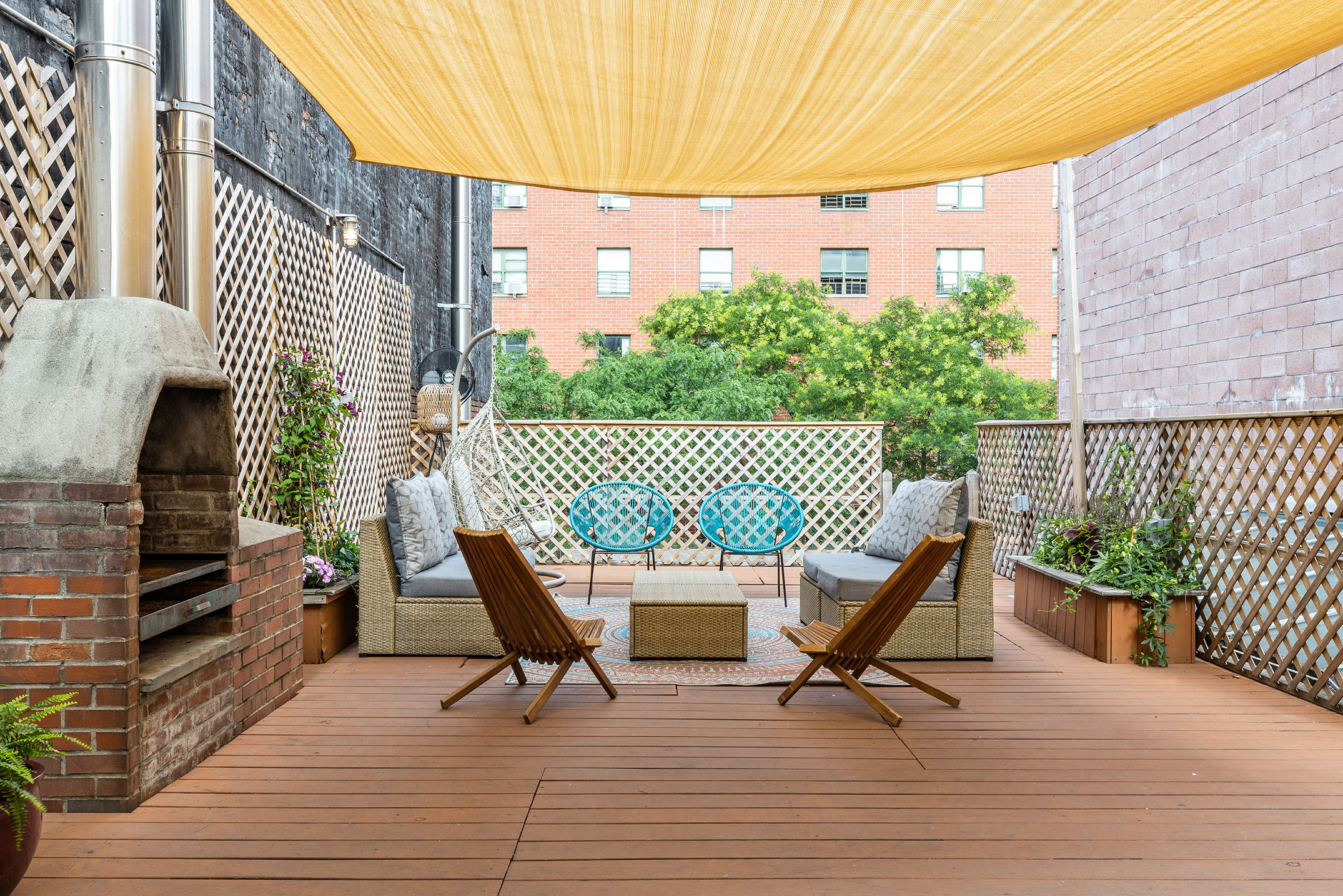 170 Eldridge Street Manhattan, NY 10002 - Photo 16 of 19 a view of a roof deck with furniture