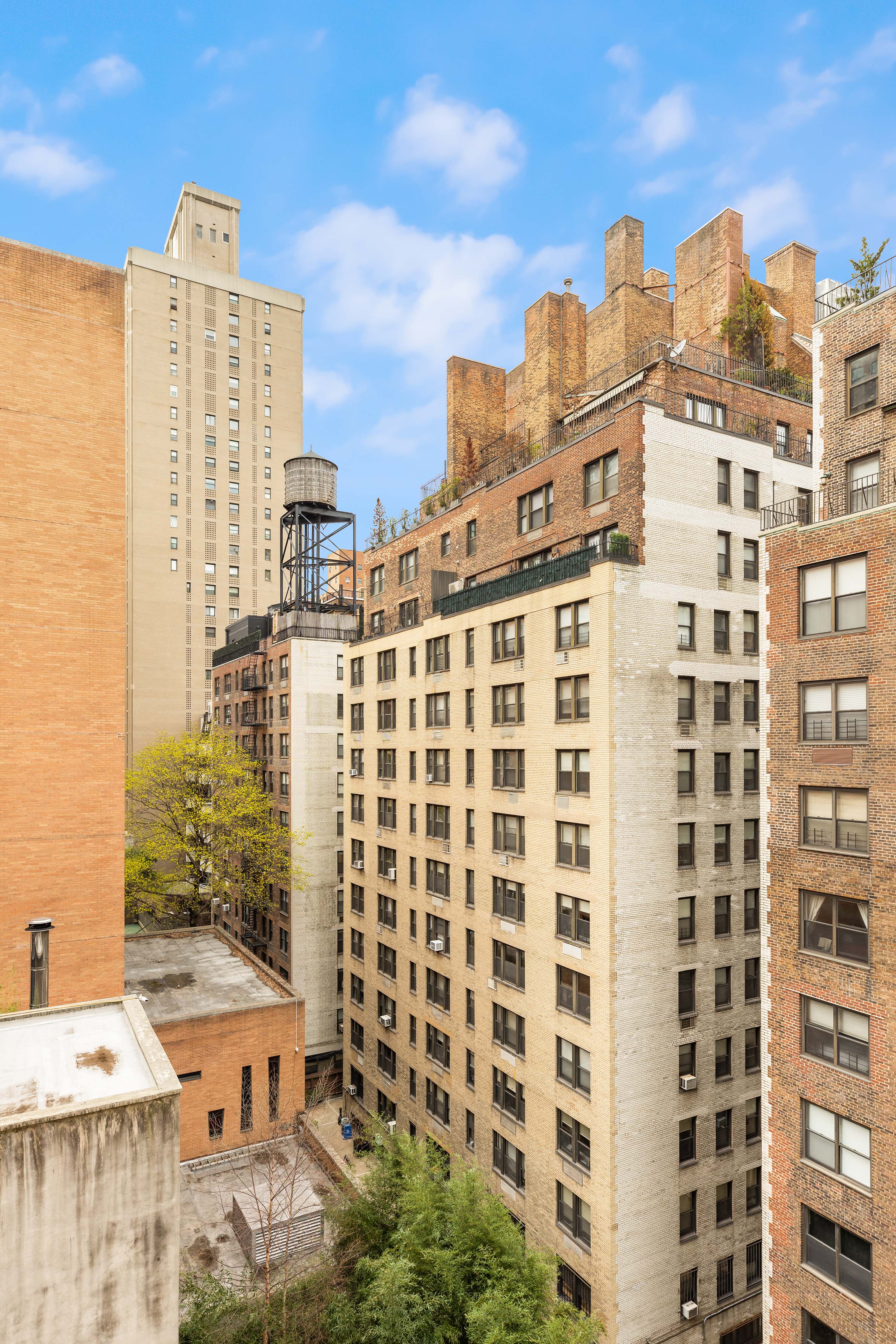 245 East 72nd Street, Unit 8G Manhattan, NY 10021 - Photo 9 of 10 a view of a city with tall buildings
