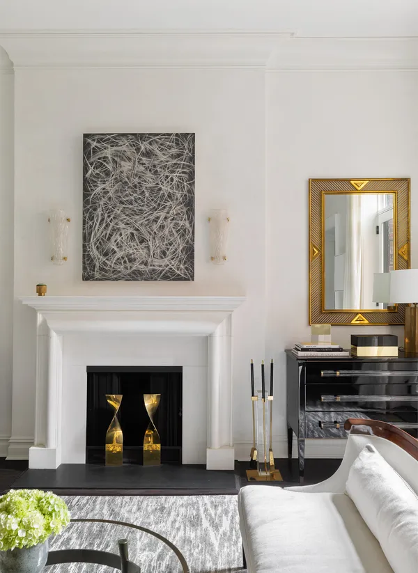 a view of a livingroom with furniture and a fireplace