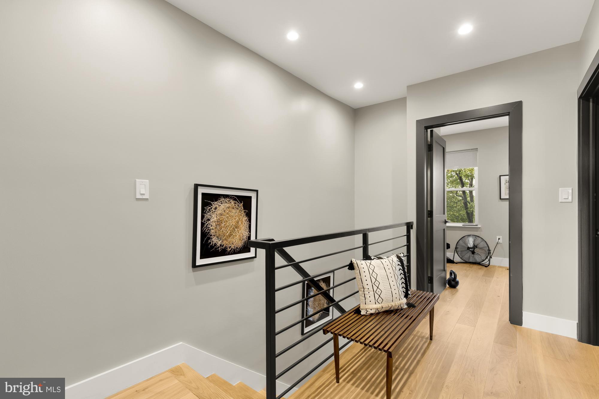 47 T Street Northeast Washington, DC 20002 - Photo 24 of 45 a bedroom with bed and wooden floor