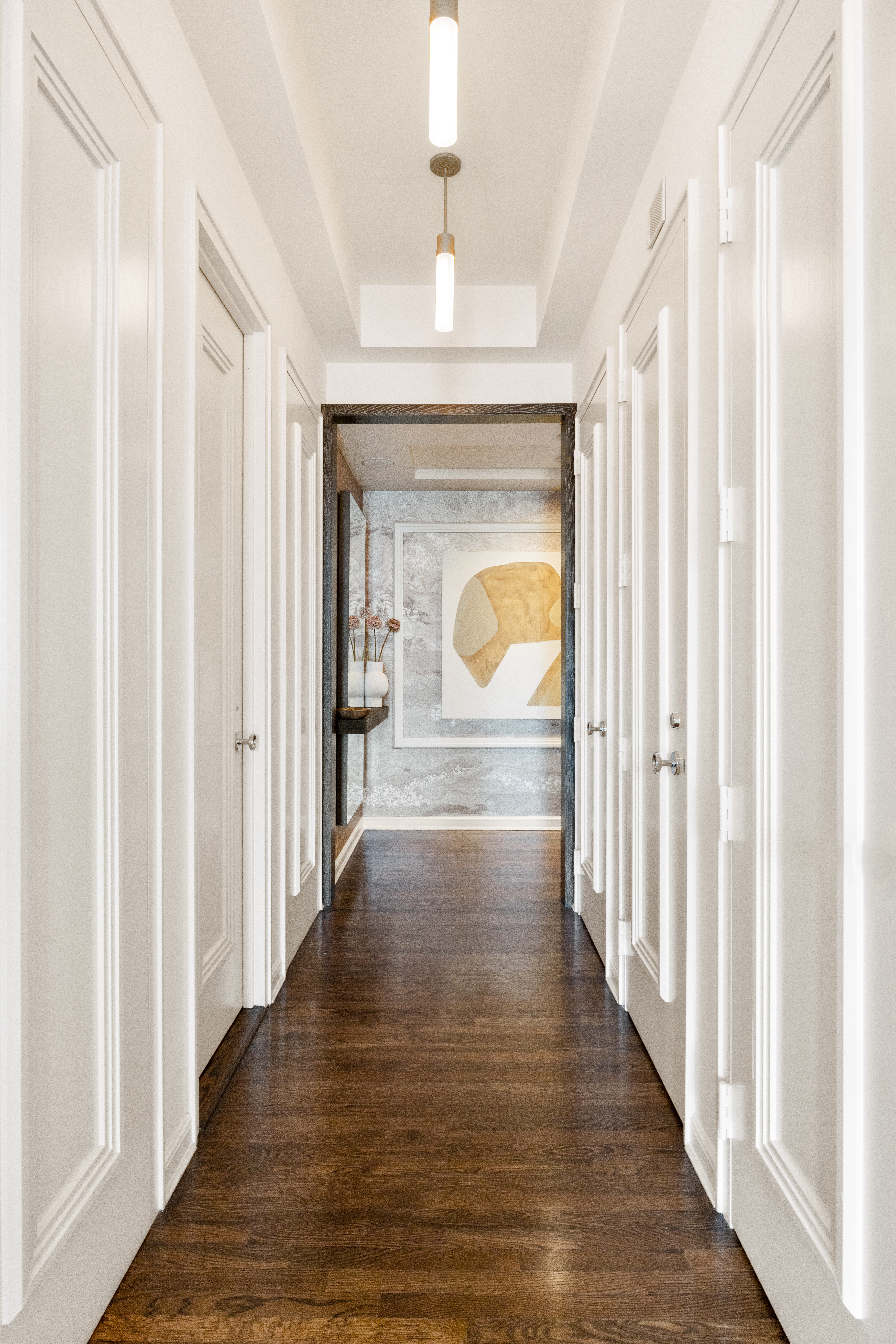 252 7th Avenue, Unit 17I Manhattan, NY 10001 - Photo 11 of 17 a view of a hallway with wooden floor