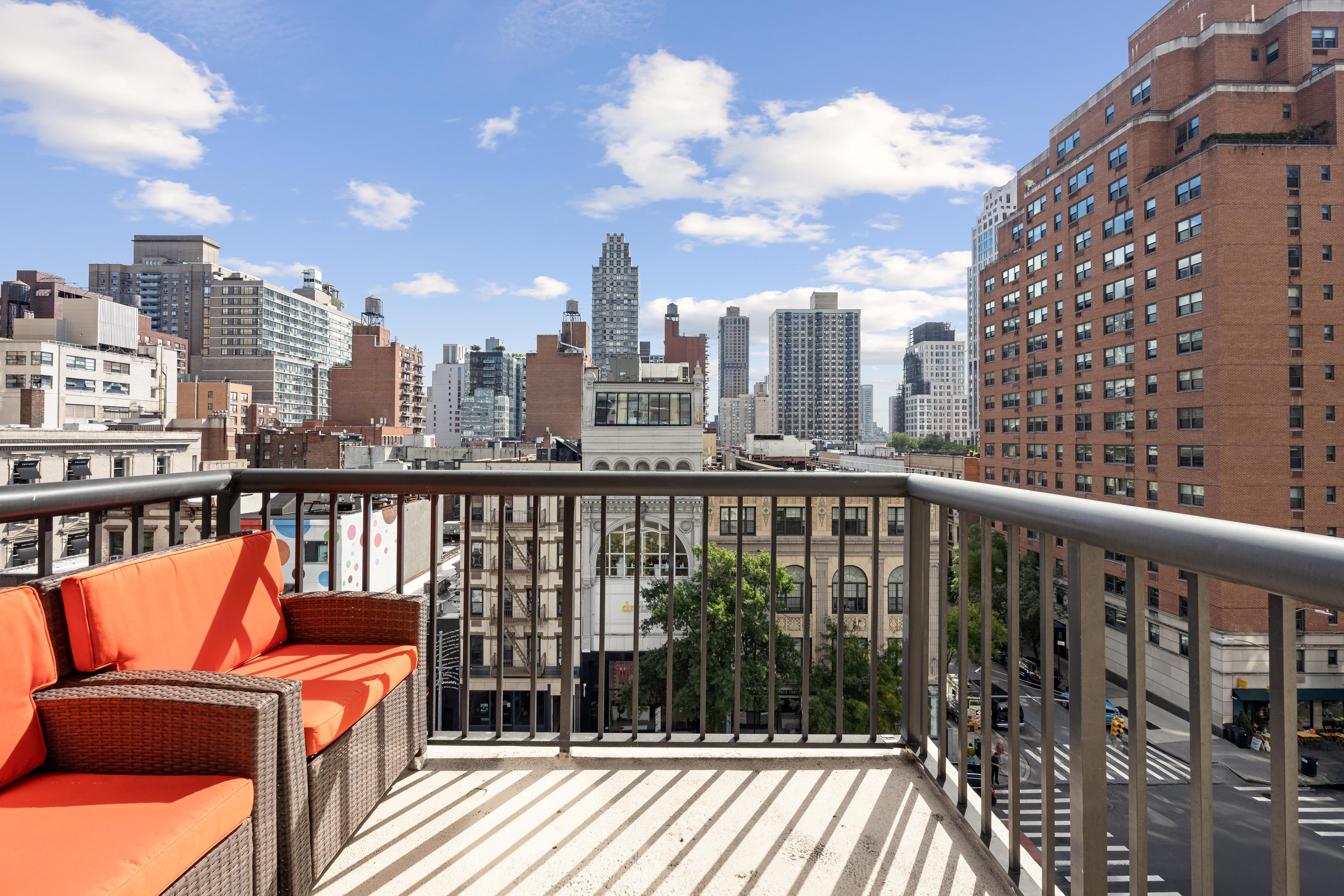 171 East 84th Street, Unit 7B Manhattan, NY 10028 - Photo 6 of 19 a balcony with an outdoor seating