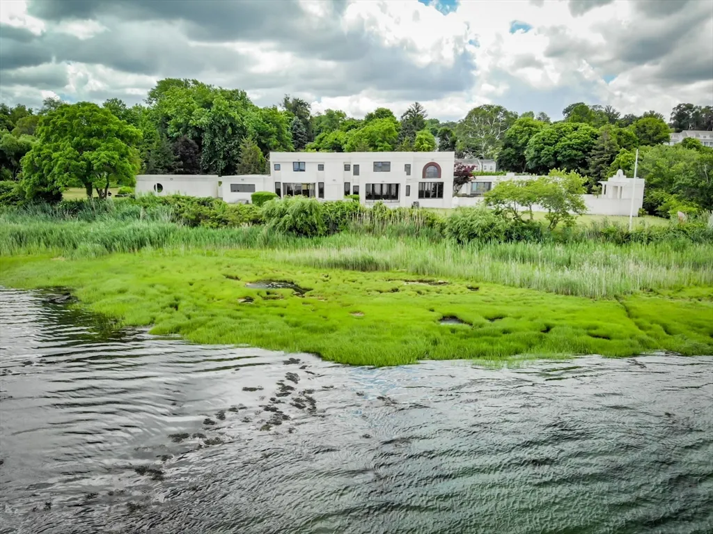 a view of a backyard of the house