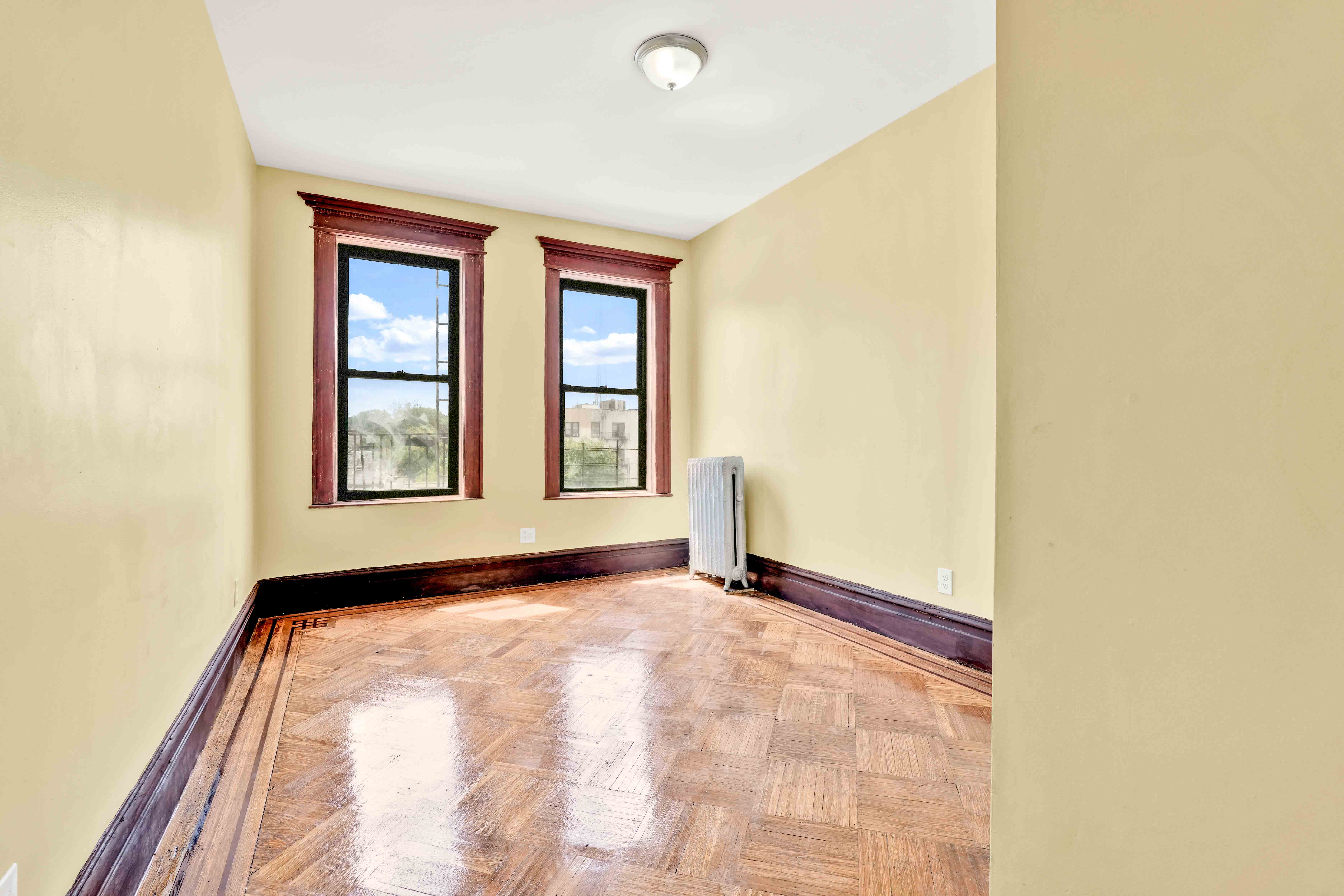 1770 Bedford Avenue Brooklyn, NY 11225 - Photo 20 of 50 a view of an empty room and window