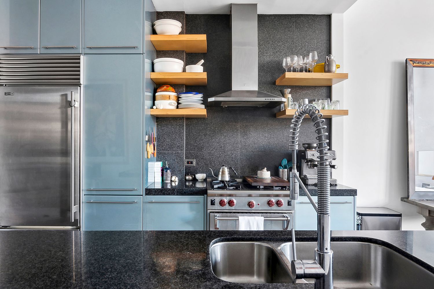 60 Broadway, Unit 2K Brooklyn, NY 11249 - Photo 6 of 7 a kitchen with a refrigerator and a stove