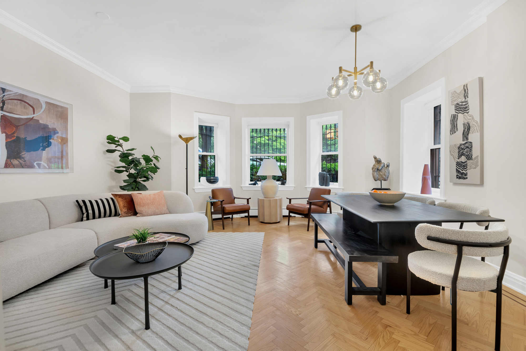 1 Mount Morris Park West, Unit 1A Manhattan, NY 10027 - Photo 2 of 12 a view of a livingroom with furniture and a chandelier