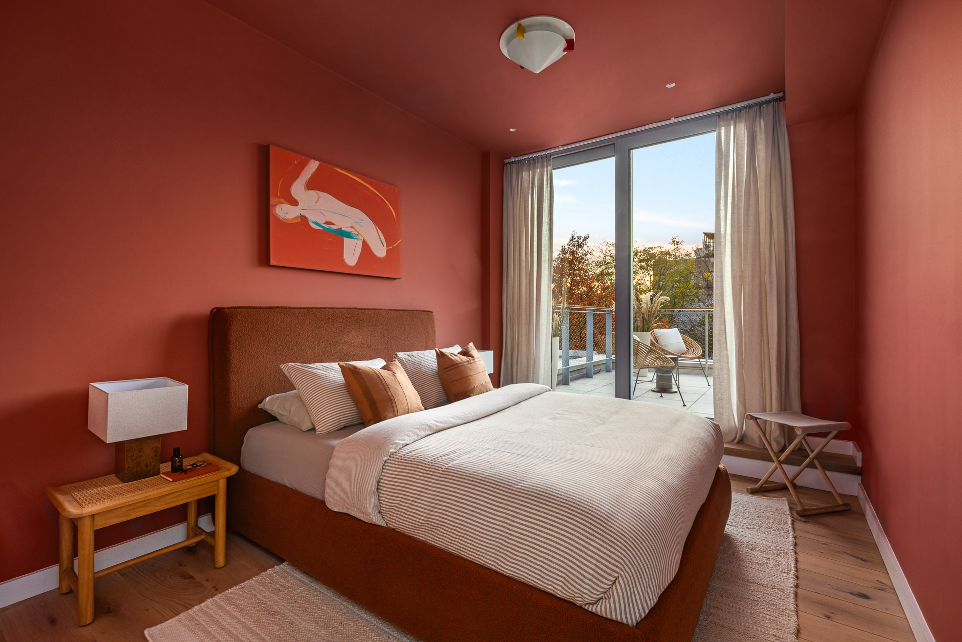 584 Leonard Street, Unit PHB Brooklyn, NY 11222 - Photo 17 of 22 a bedroom with a bed and a window