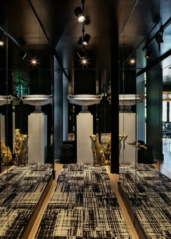 a room with lots of appliances and cabinets