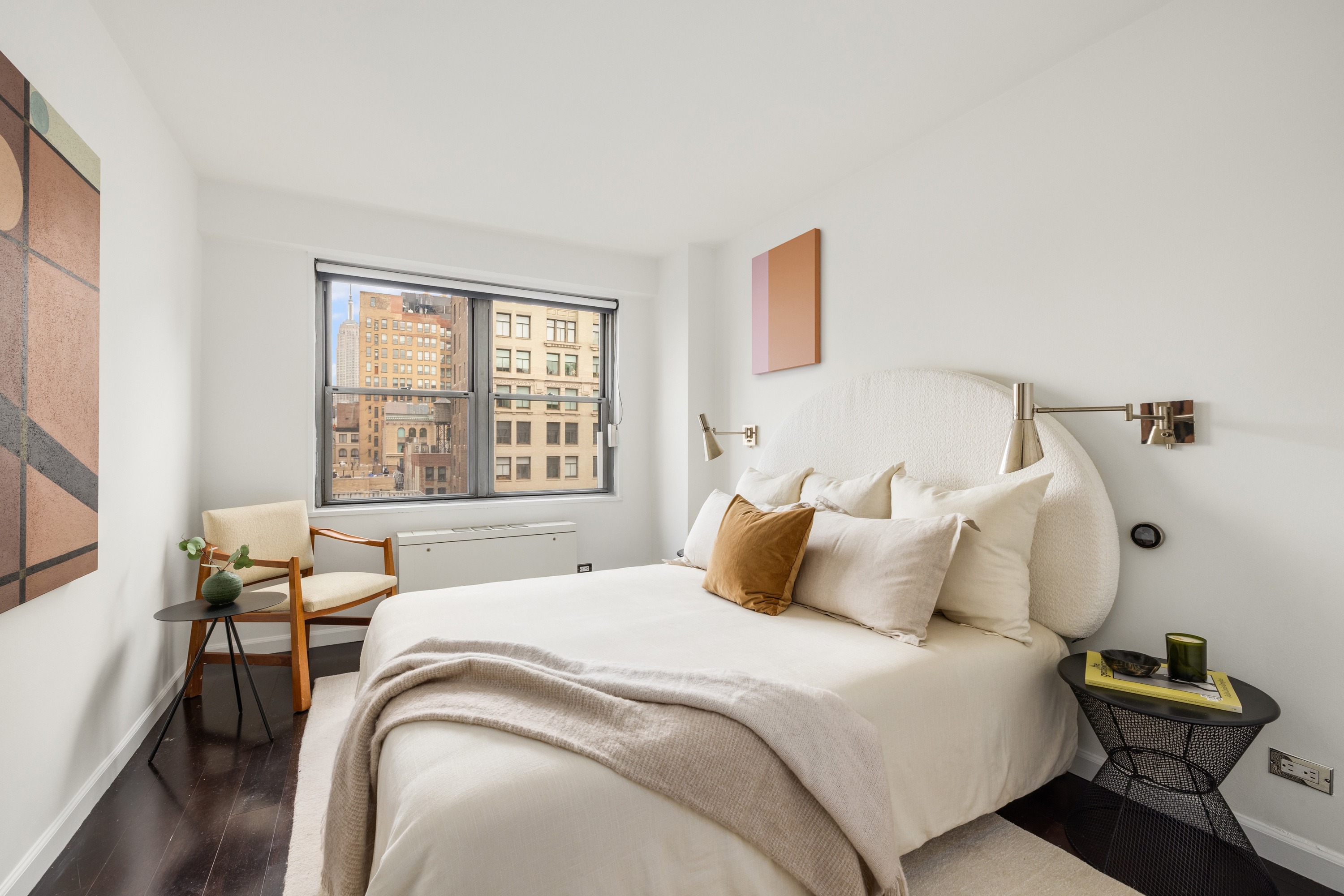 10 West 15th Street, Unit 1721 Manhattan, NY 10011 - Photo 5 of 10 a bedroom with a bed and window