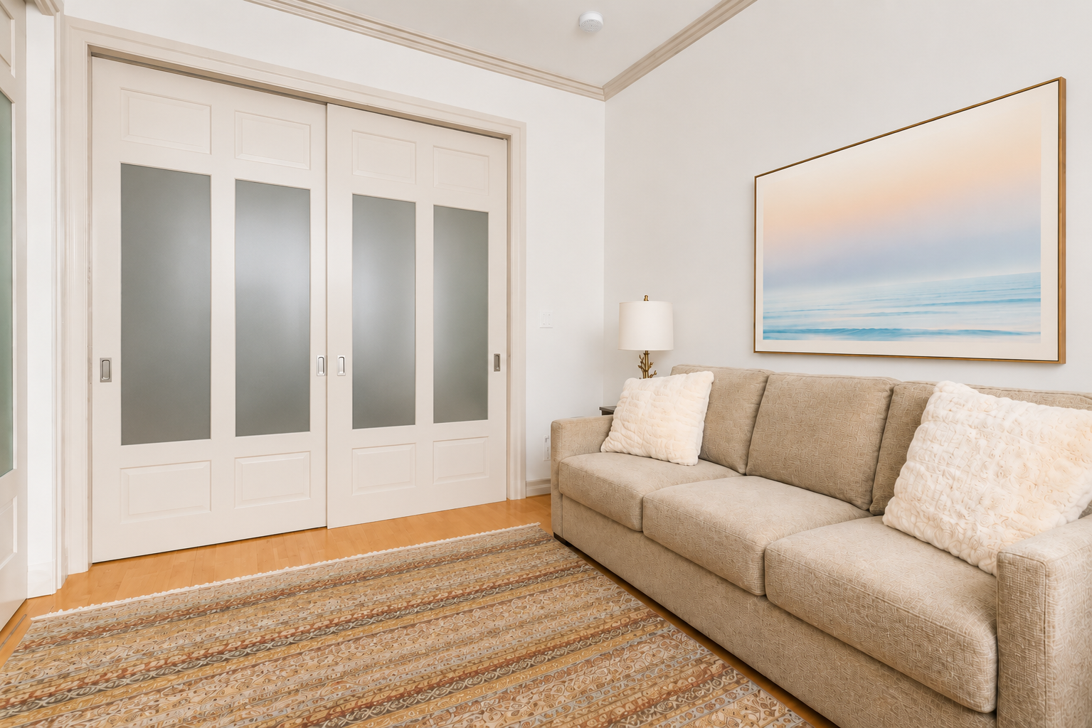 345 West 70th Street, Unit 4E Manhattan, NY 10023 - Photo 9 of 11 a living room with furniture and a painting on the wall