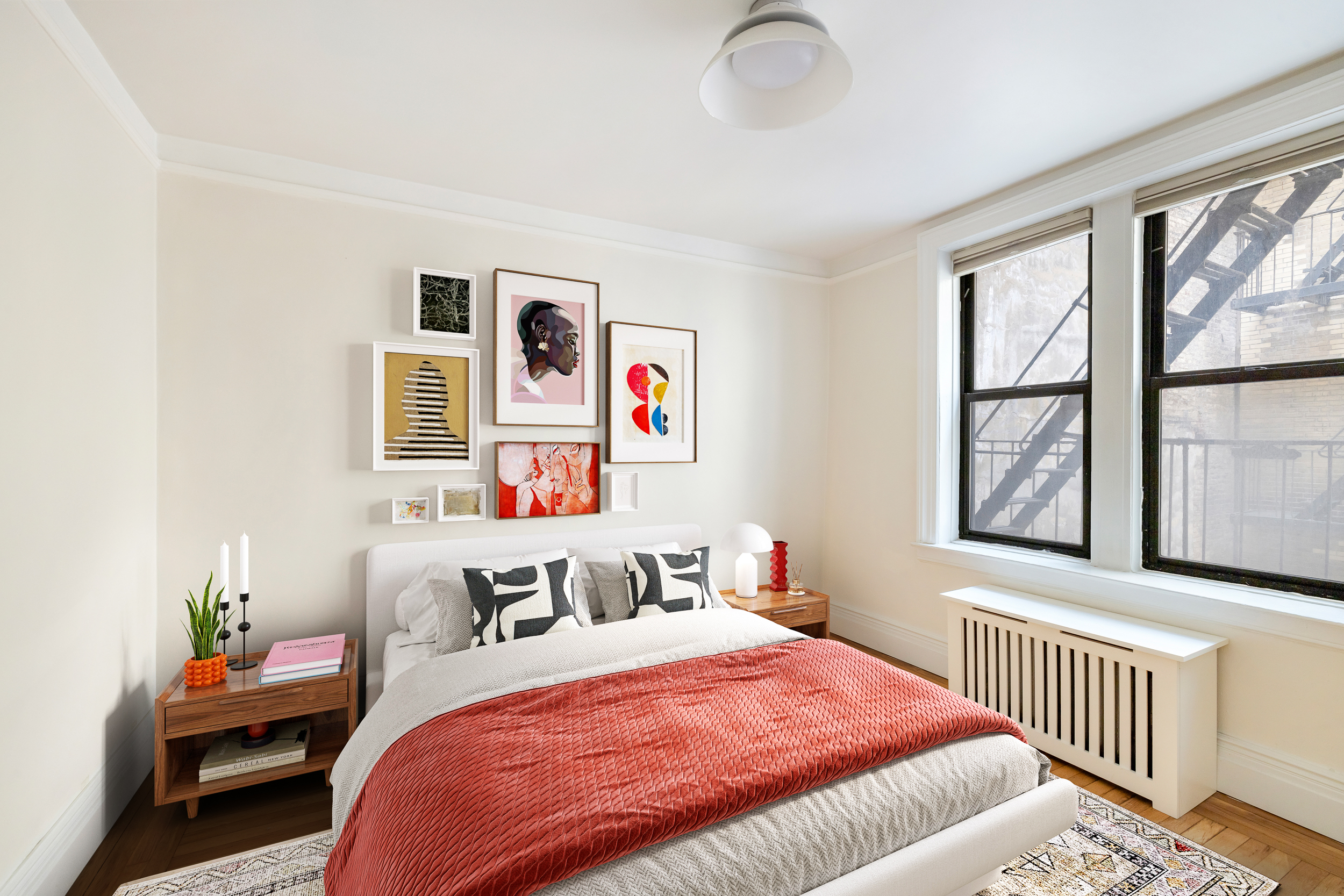 319 West 18th Street, Unit 2I Manhattan, NY 10011 - Photo 6 of 15 a bedroom with bed and windows