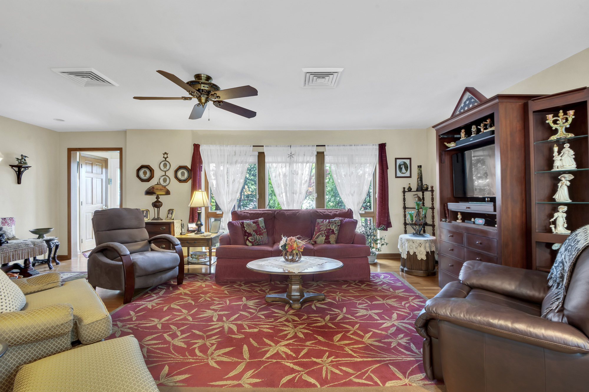 131 Jansen Street Staten Island, NY 10312 - Photo 4 of 21 a living room with furniture potted plant and a window