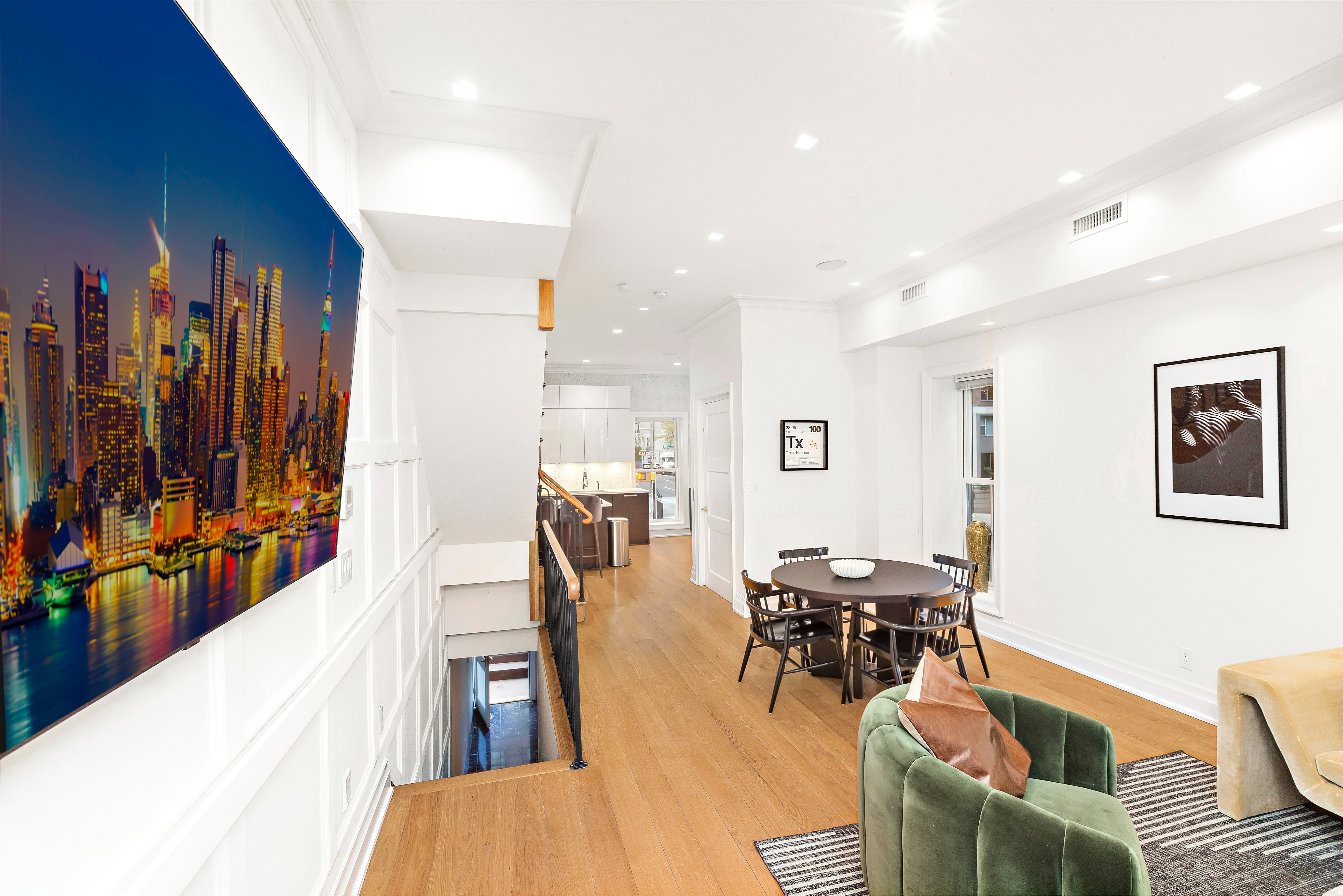 134 East 36th Street Manhattan, NY 10016 - Photo 2 of 28 a living room with furniture and wooden floor