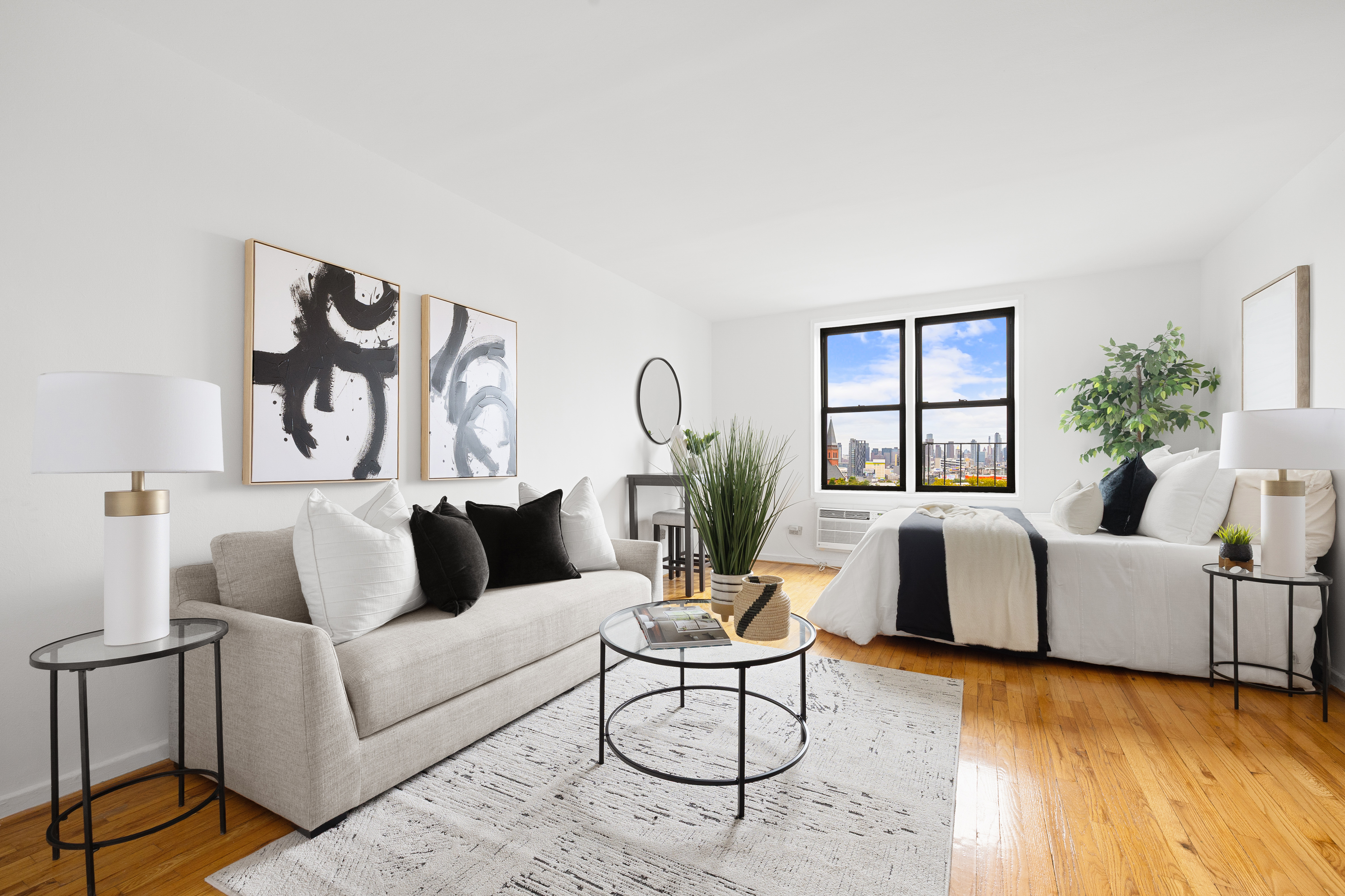 50-21 39th Place, Unit 6D Queens, NY 11104 - Photo 7 of 15 a living room with furniture and wooden floor