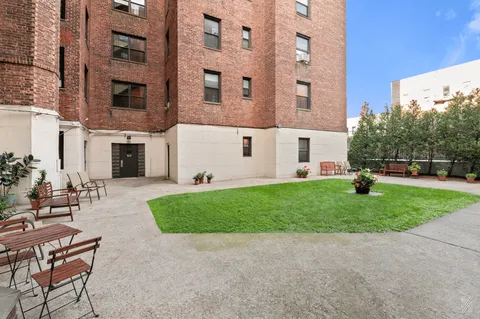 front view of a building with a yard