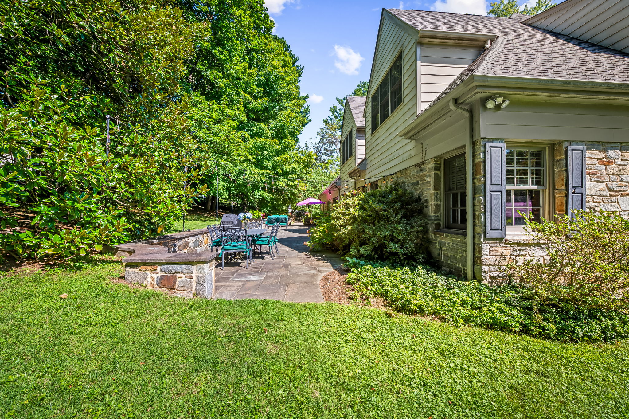 910 Army Road Towson, MD 21204 - Photo 59 of 62 a view of a chair and table in the garden front of house