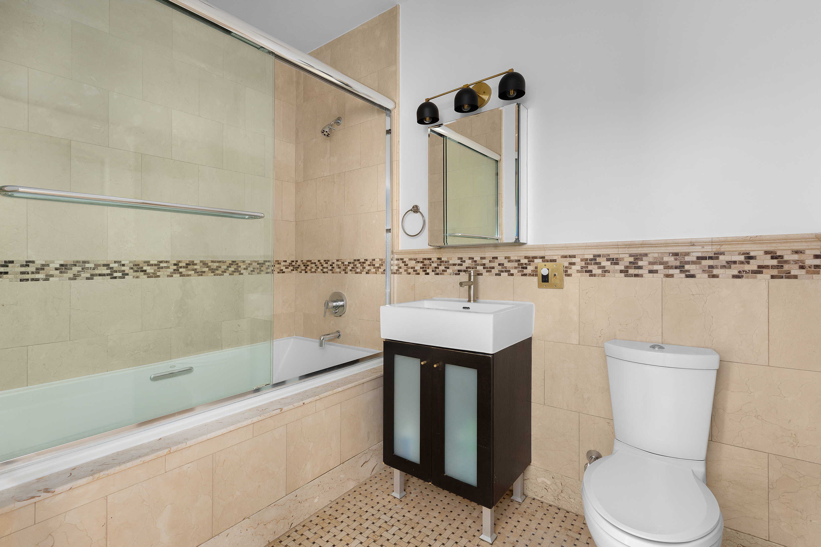 225 Pacific Street, Unit 3C Brooklyn, NY 11201 - Photo 6 of 10 a bathroom with a sink toilet and shower